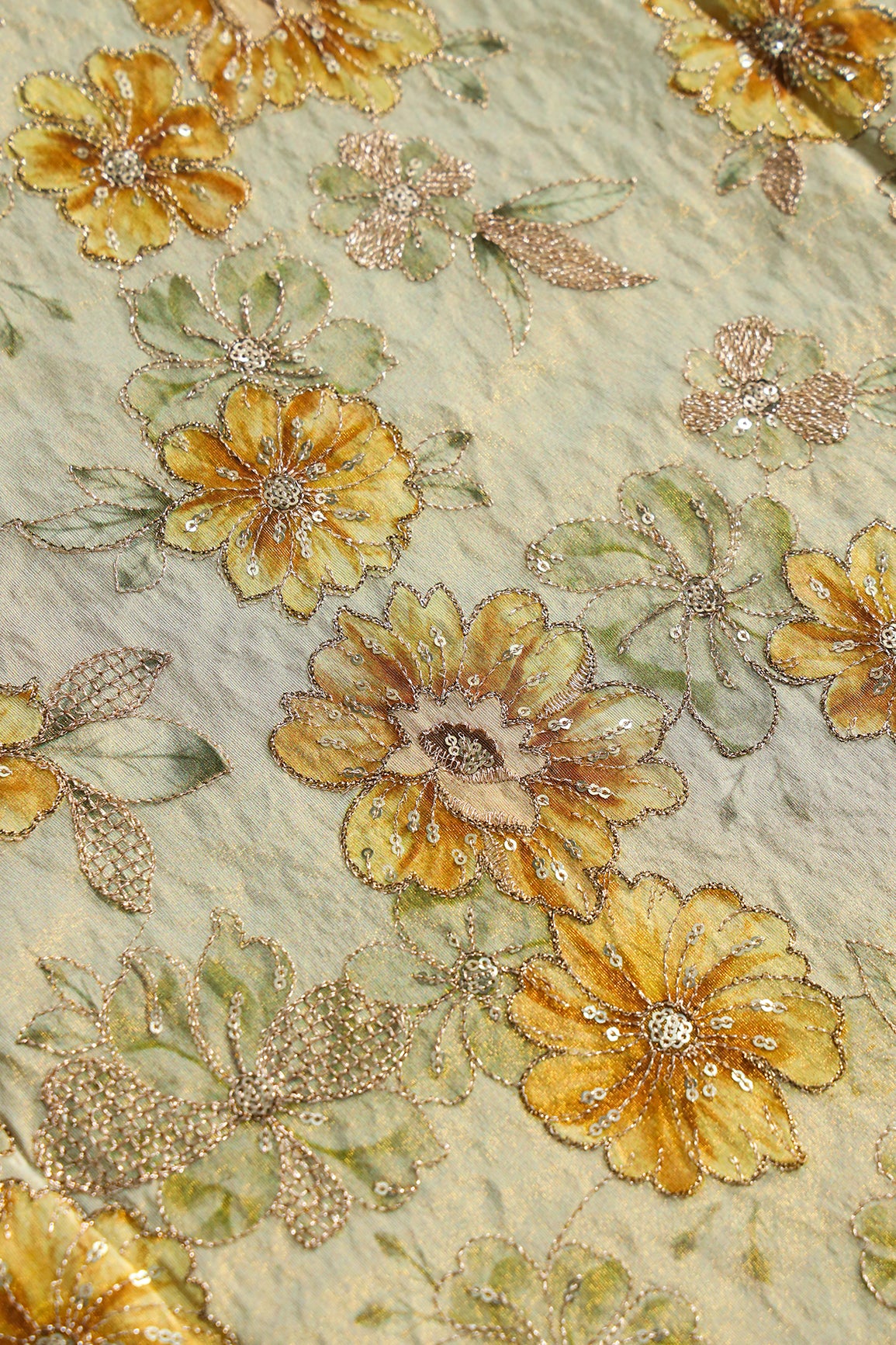 Floral Position Print On Gold Zari With Sequins Embroidery On Olive Viscose Zari Tissue Fabric