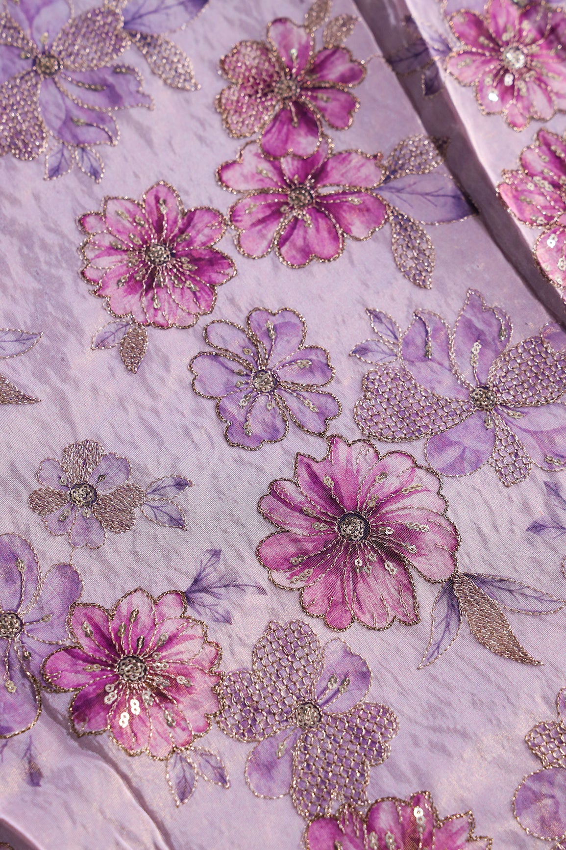 Floral Position Print On Gold Zari With Sequins Embroidery On Lavender Viscose Zari Tissue Fabric