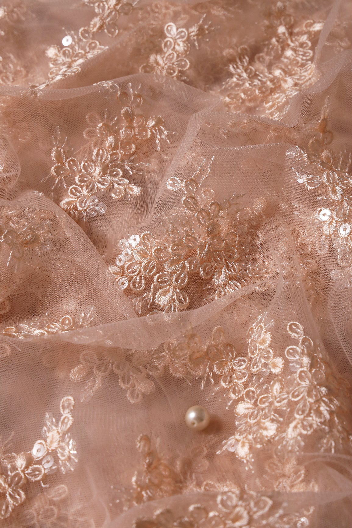 Exclusive Peach Thread With Sequins Abstract Embroidery Work On Light Peach Soft Net Fabric