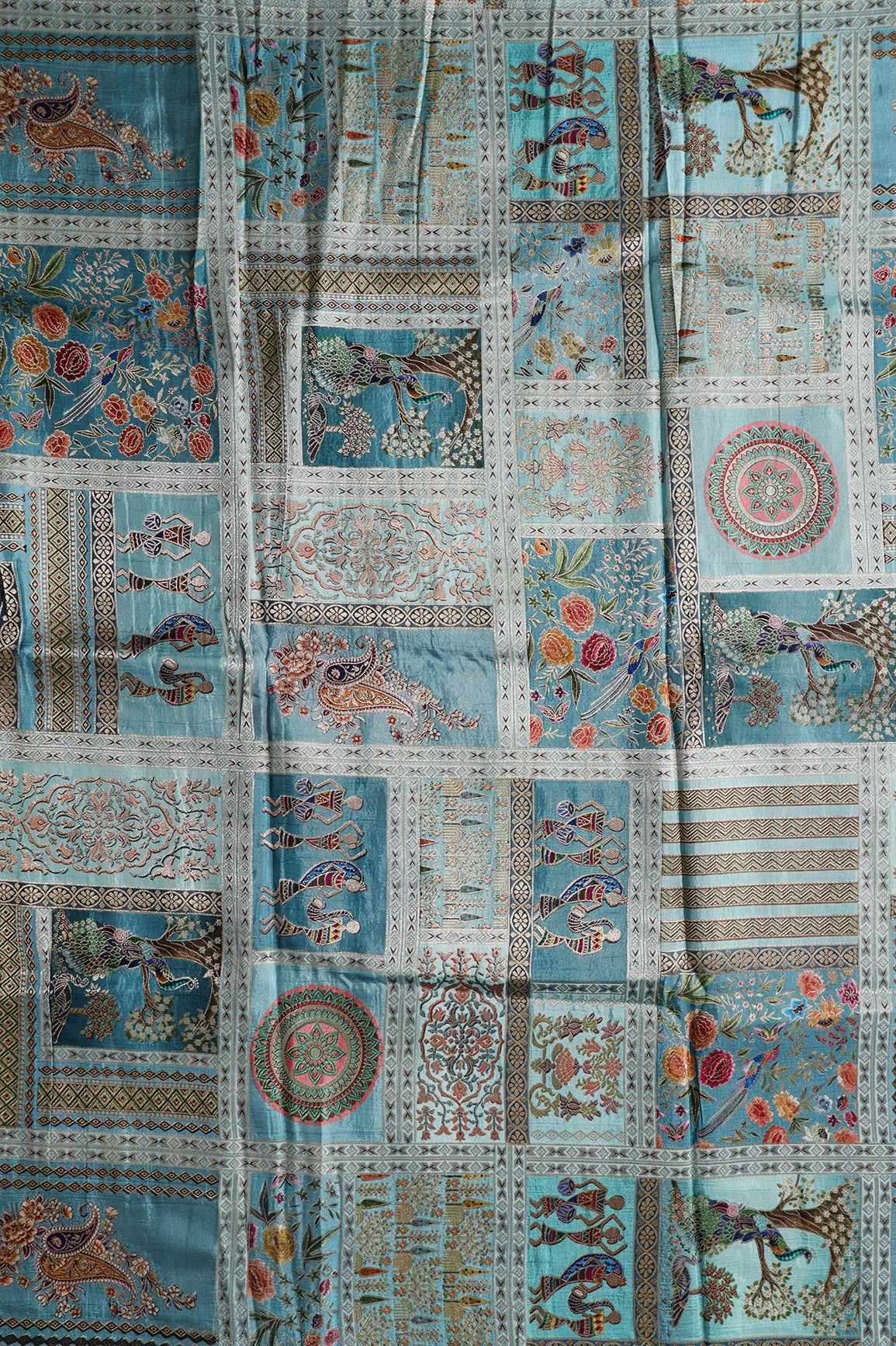 Positional Floral Print On Pastel Blue Viscose Dola Silk Jacquard Fabric