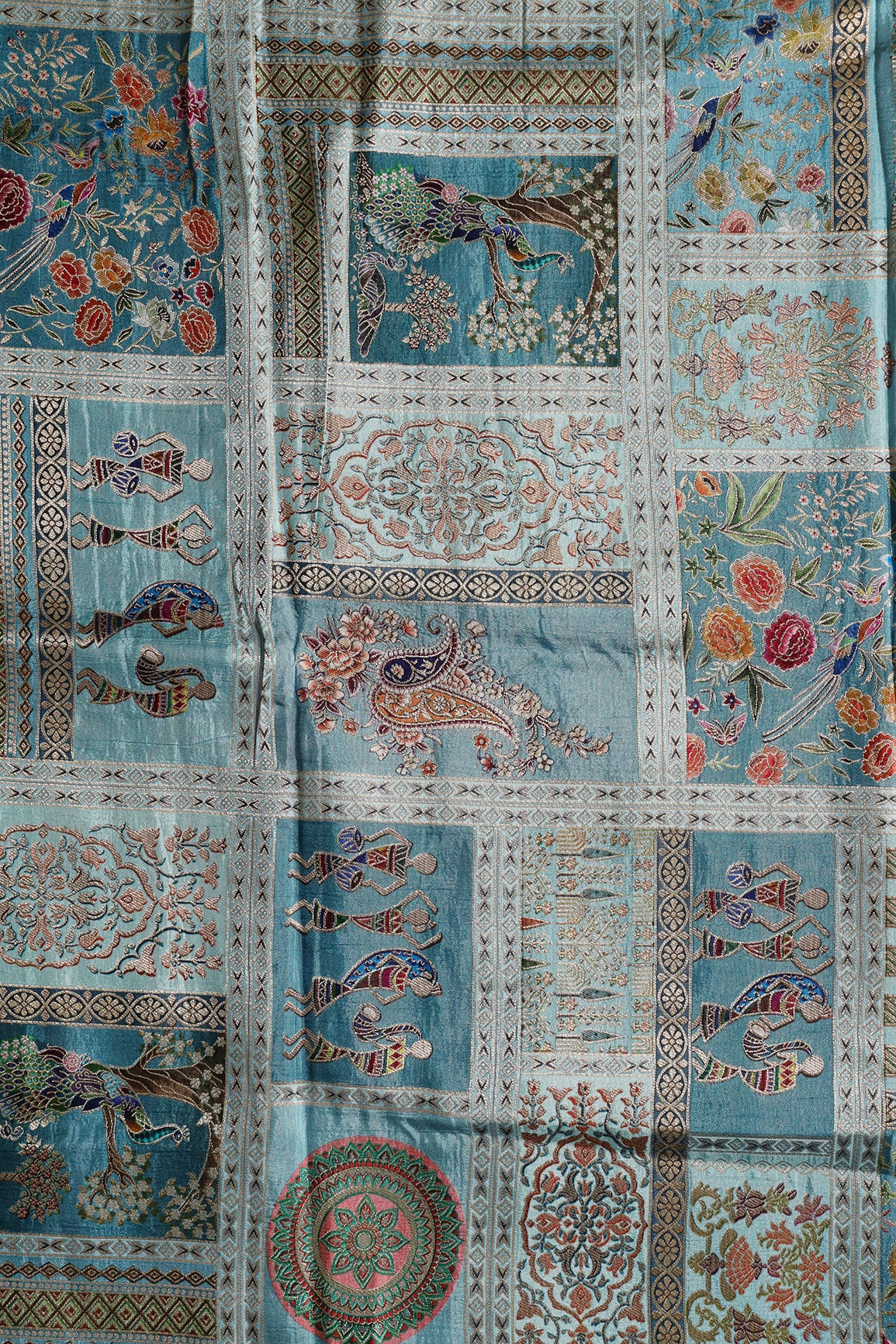 Positional Floral Print On Pastel Blue Viscose Dola Silk Jacquard Fabric