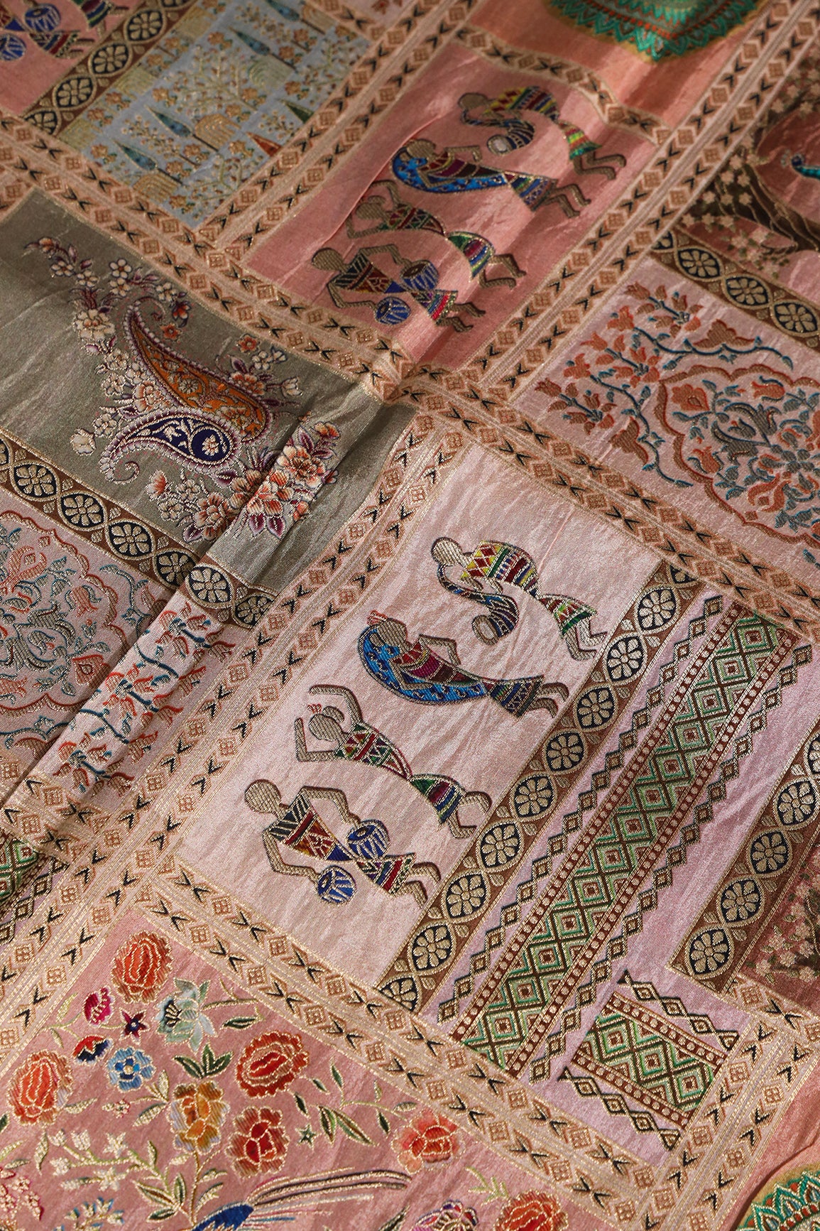 Positional Floral Print On Pastel Peach Viscose Dola Silk Jacquard Fabric