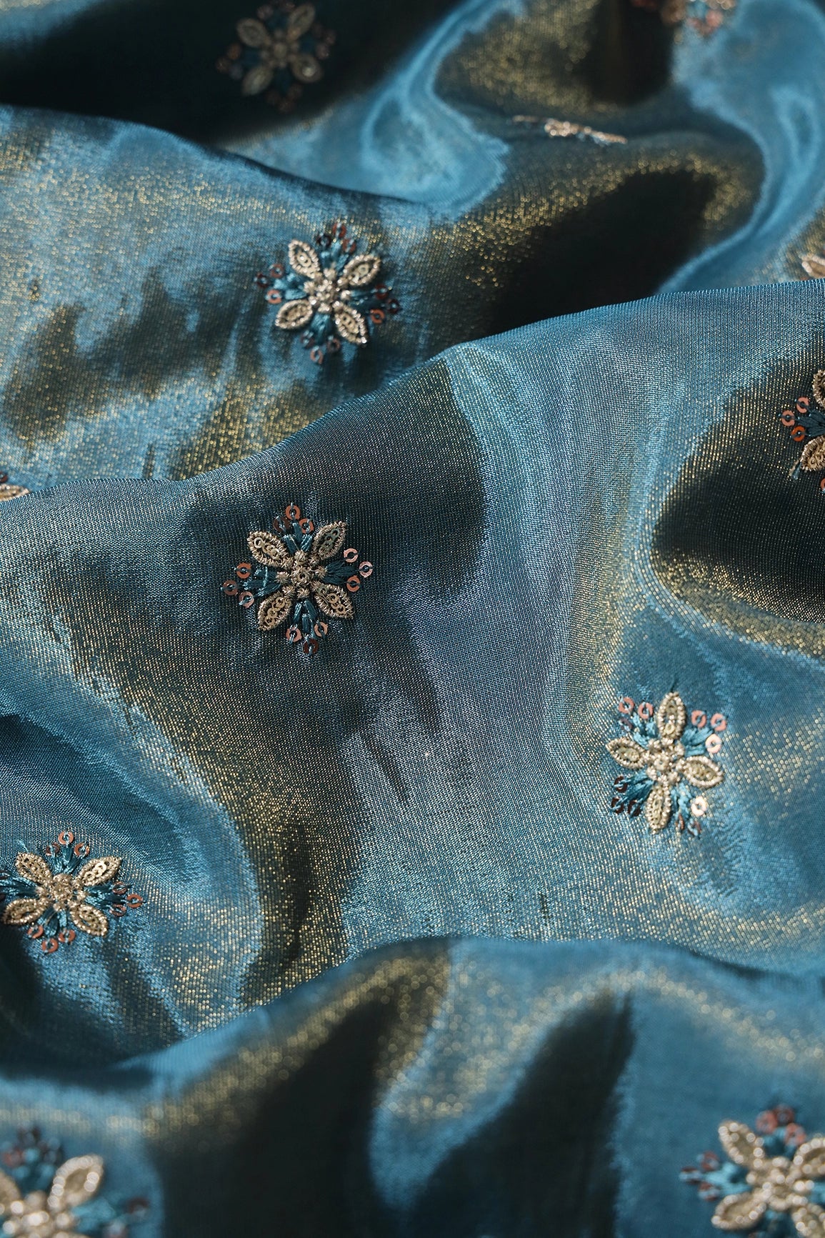 Gold Sequins And Zari Floral Booti Embroidery Work On Turkish Blue Pure Viscose Zari Tissue Fabric