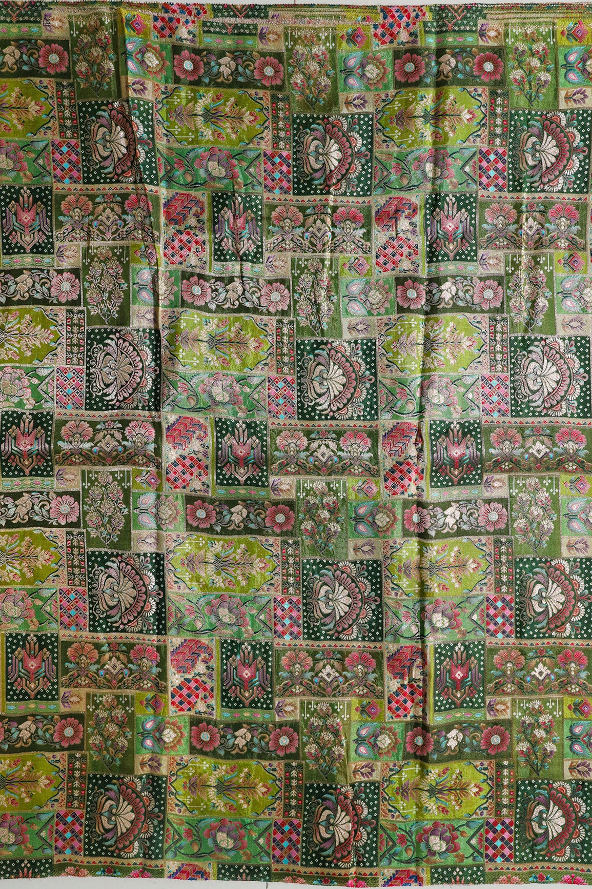 Positional Floral Print On Pastel Green Viscose Dola Silk Jacquard Fabric