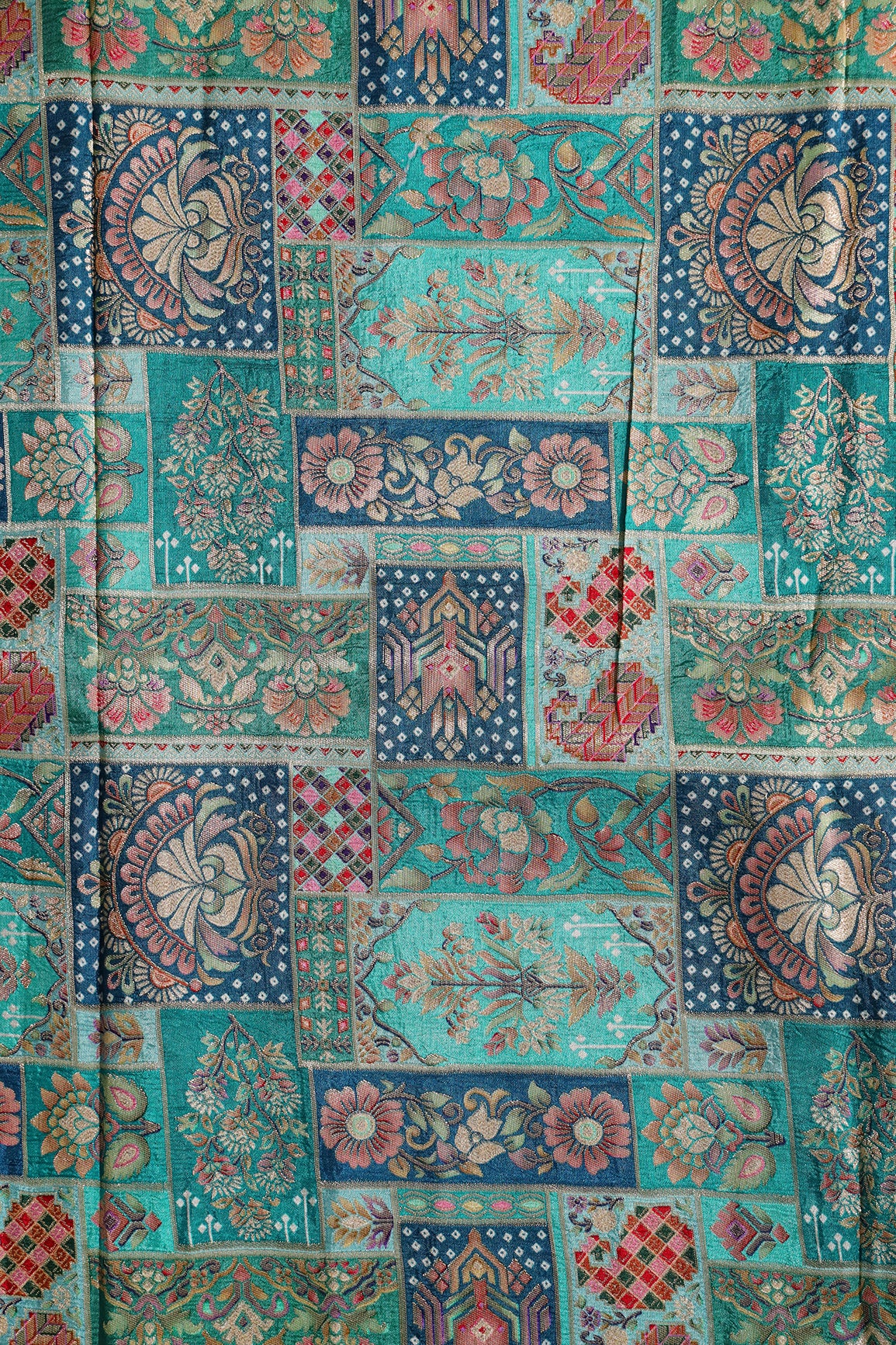 Positional Floral Print On Teal Viscose Dola Silk Jacquard Fabric