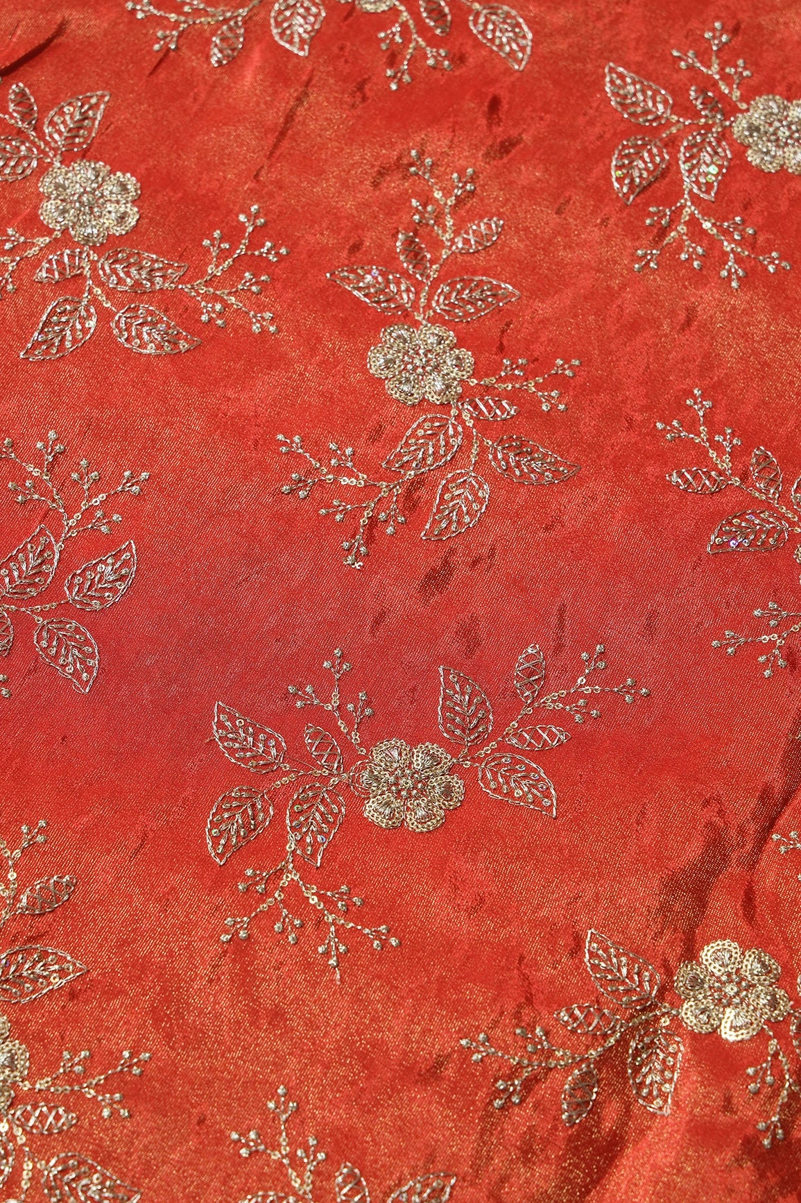 Gold Sequins And Zari Floral Embroidery Work On Dark Orange Pure Viscose Zari Tissue Fabric