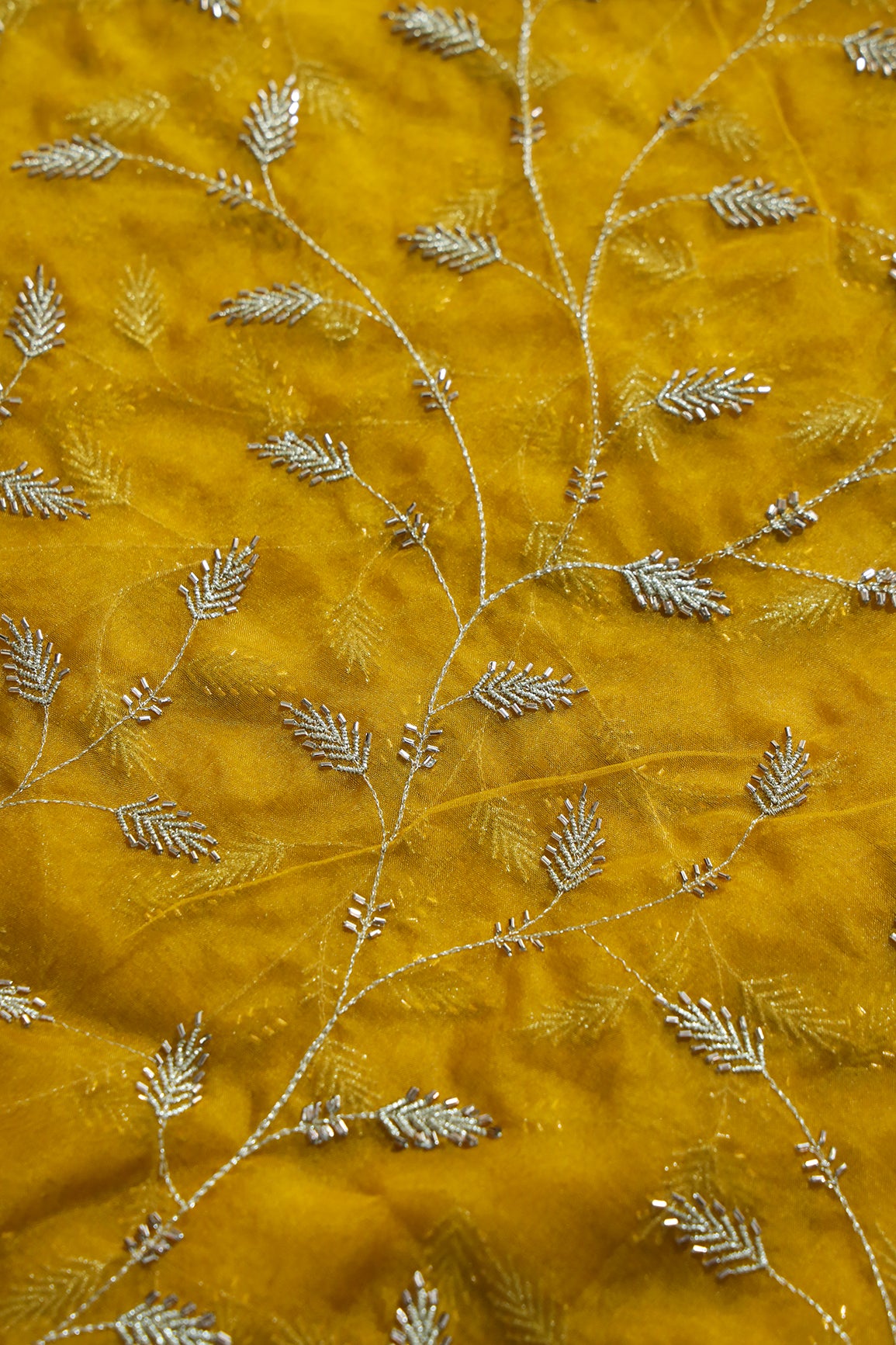 Gold Zari With Beads Leafy Embroidery Work On Yellow Organza Fabric