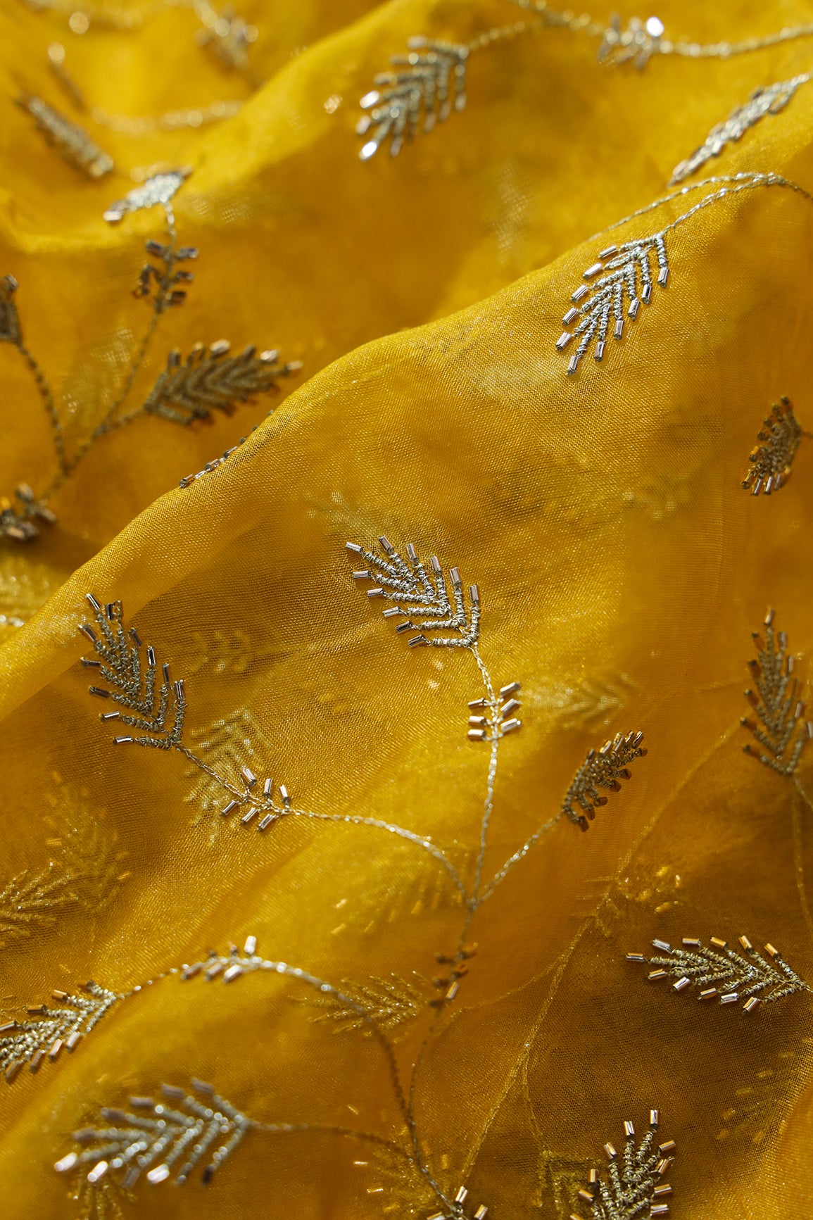 Gold Zari With Beads Leafy Embroidery Work On Yellow Organza Fabric