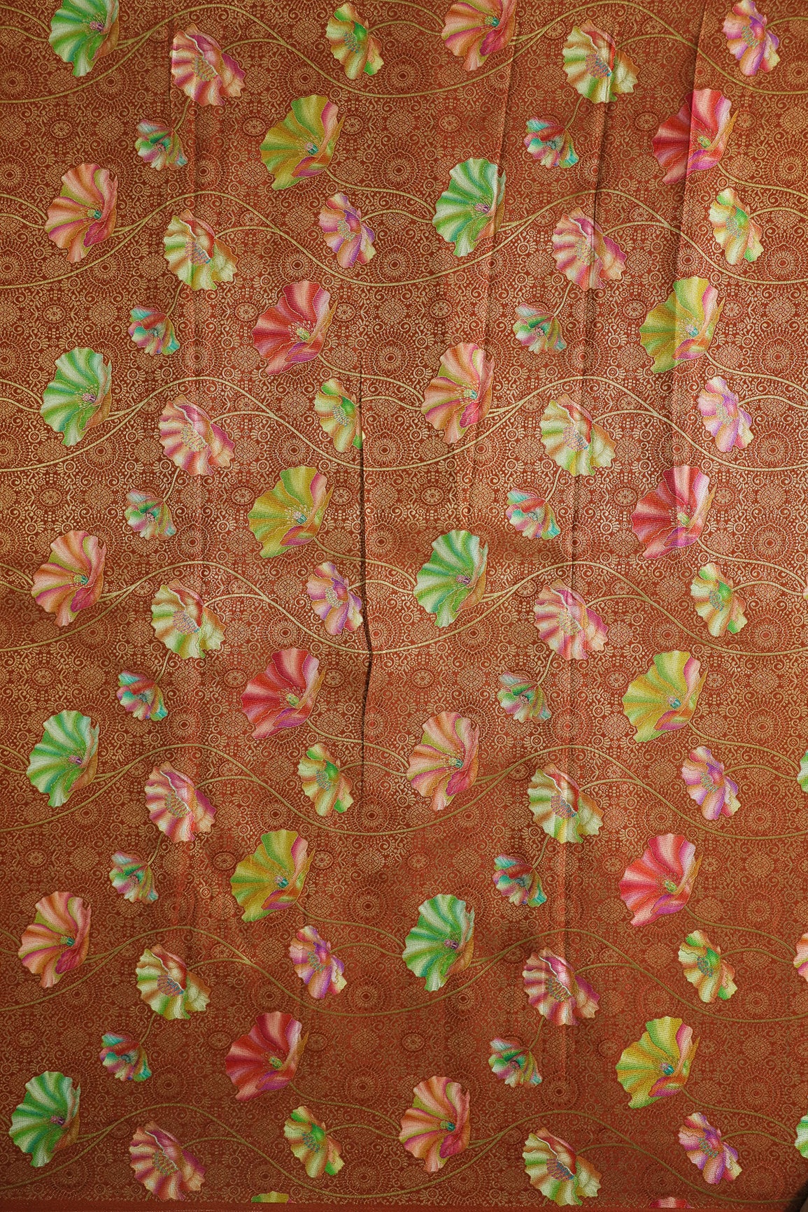 Positional Print On Rust Viscose Dola Silk Jacquard Fabric