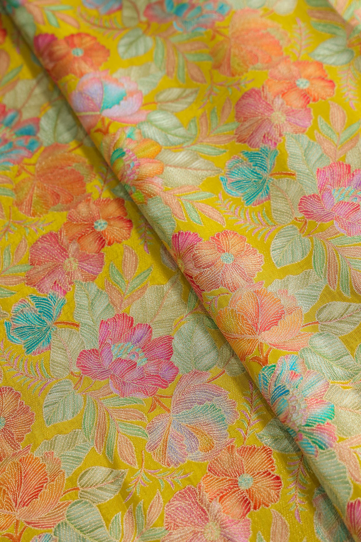 Positional Floral Print On Yellow Viscose Dola Silk Jacquard Fabric