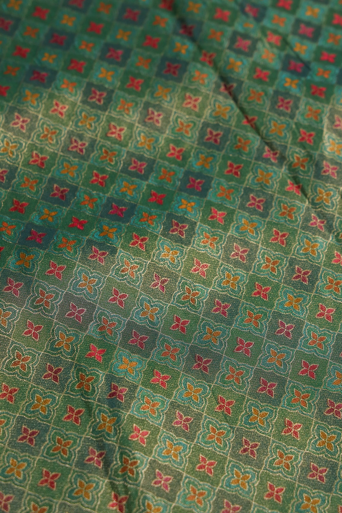 Positional Print On Green Viscose kanjivaram Silk Jacquard Fabric