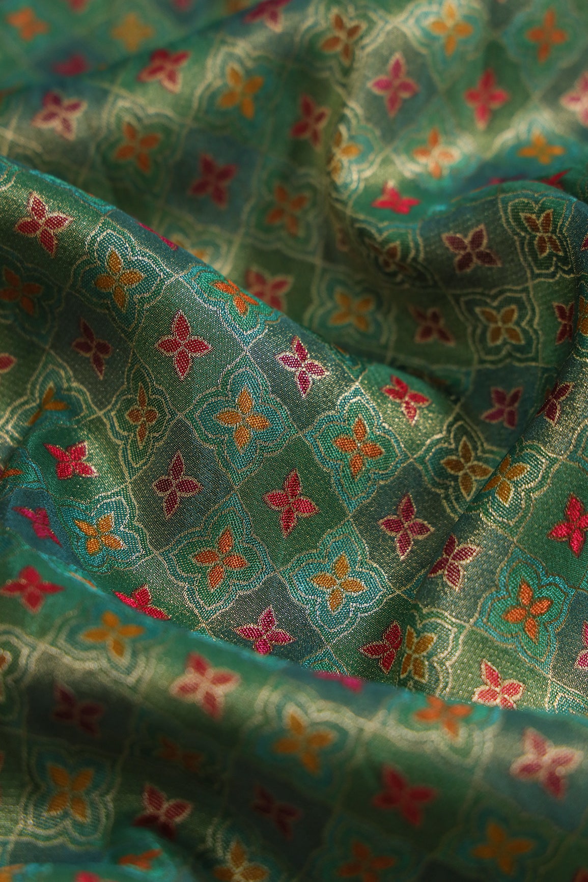 Positional Print On Green Viscose kanjivaram Silk Jacquard Fabric