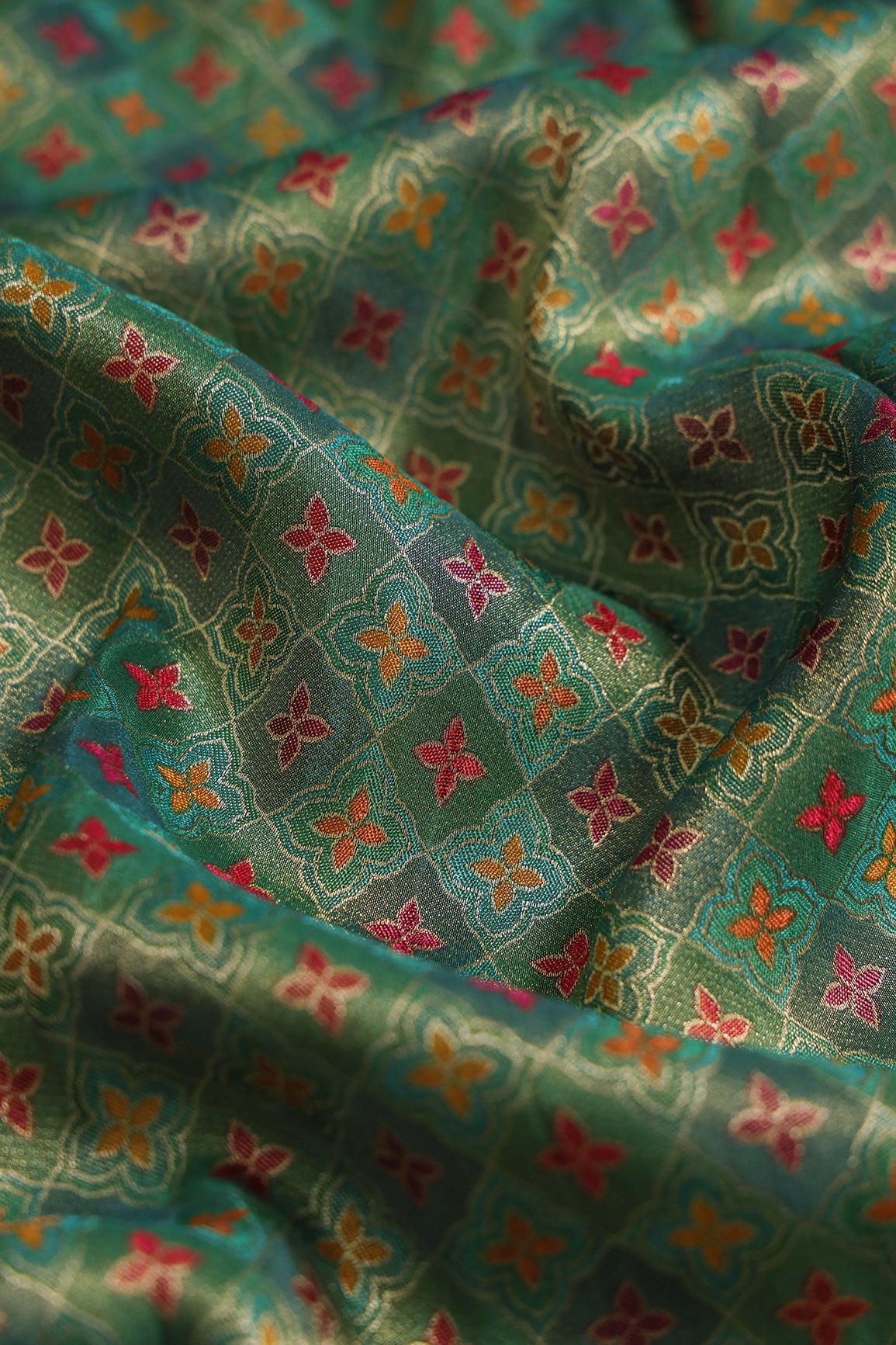 Positional Print On Green Viscose kanjivaram Silk Jacquard Fabric