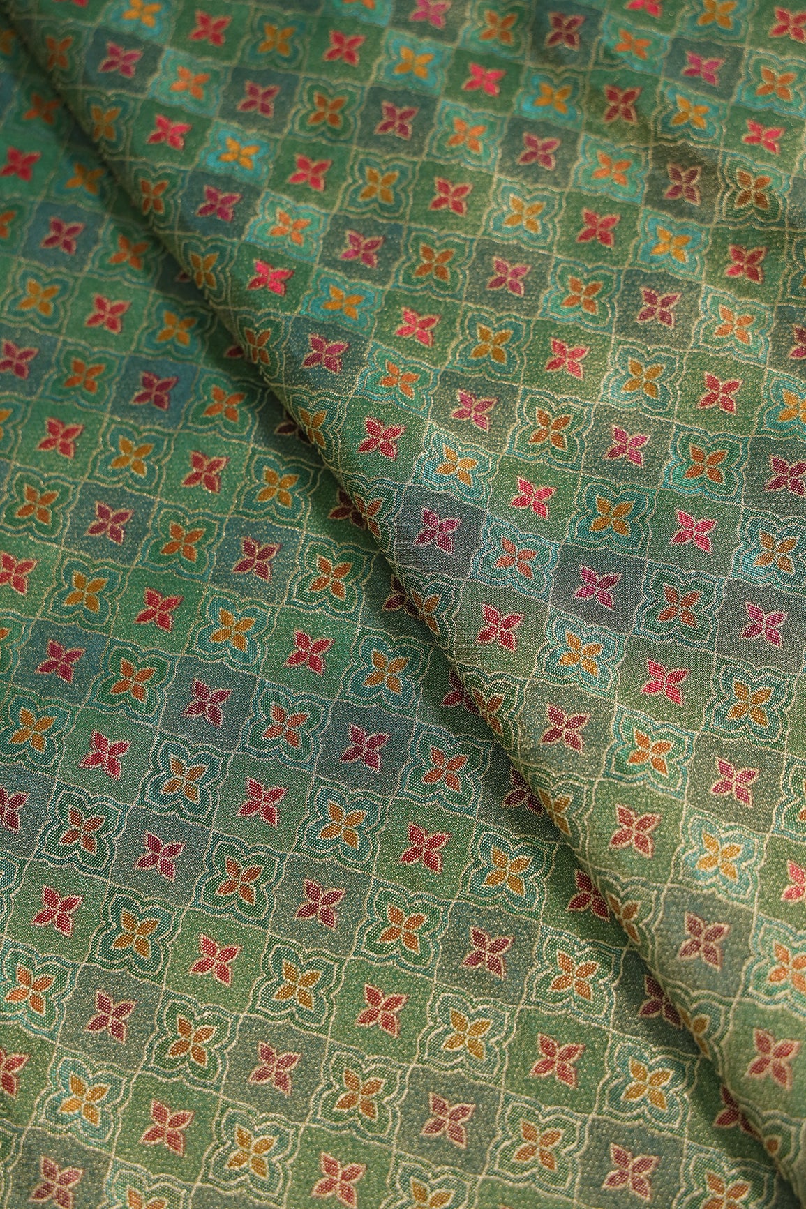 Positional Print On Green Viscose kanjivaram Silk Jacquard Fabric