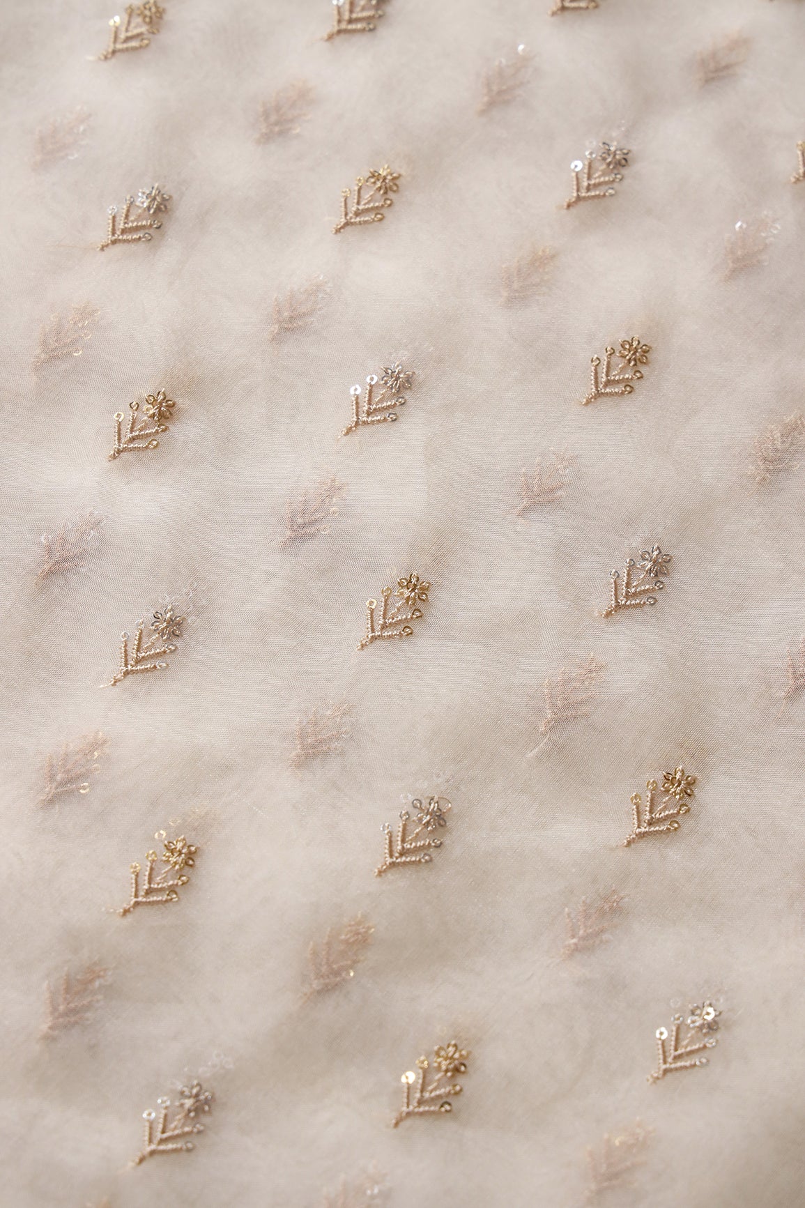 Gold And Silver Sequins Beautiful Small Floral Motif Embroidery Work On Cream Organza Fabric