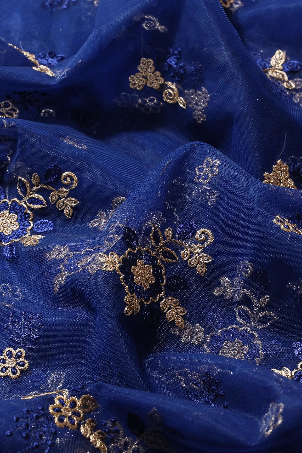 Blue Thread With Gold Zari Floral Embroidery Work On Navy Blue Soft Net Fabric