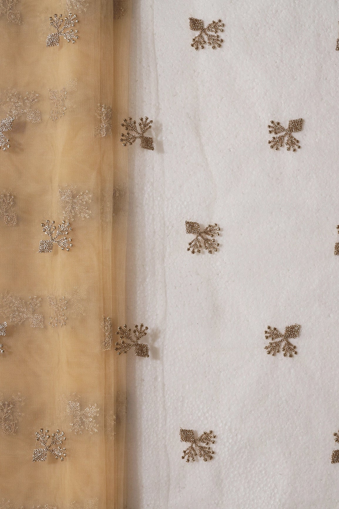 Small Gold Glitter Sequins With Zari Floral Embroidery On Beige Soft Net Fabric