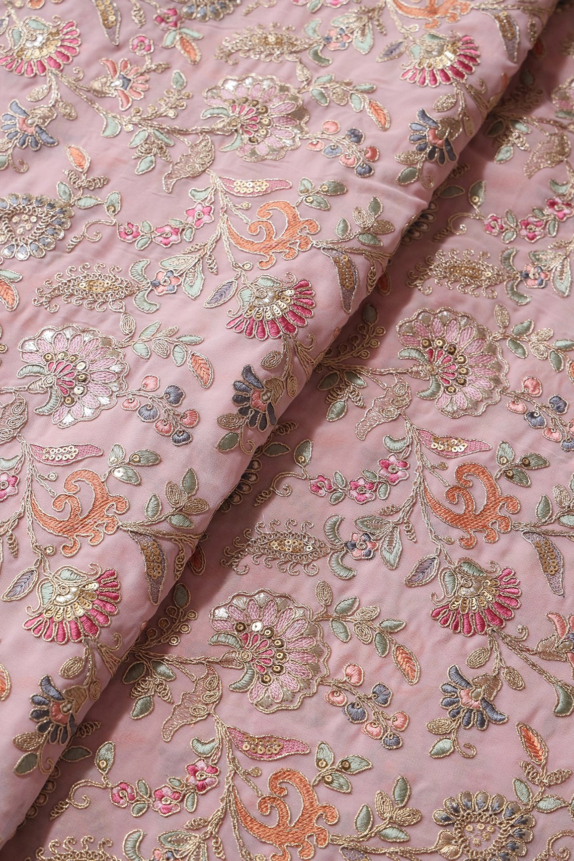 Gorgeous Pastel Threads With Gold Zari Floral Heavy Embroidery On Light Pink Georgette Fabric