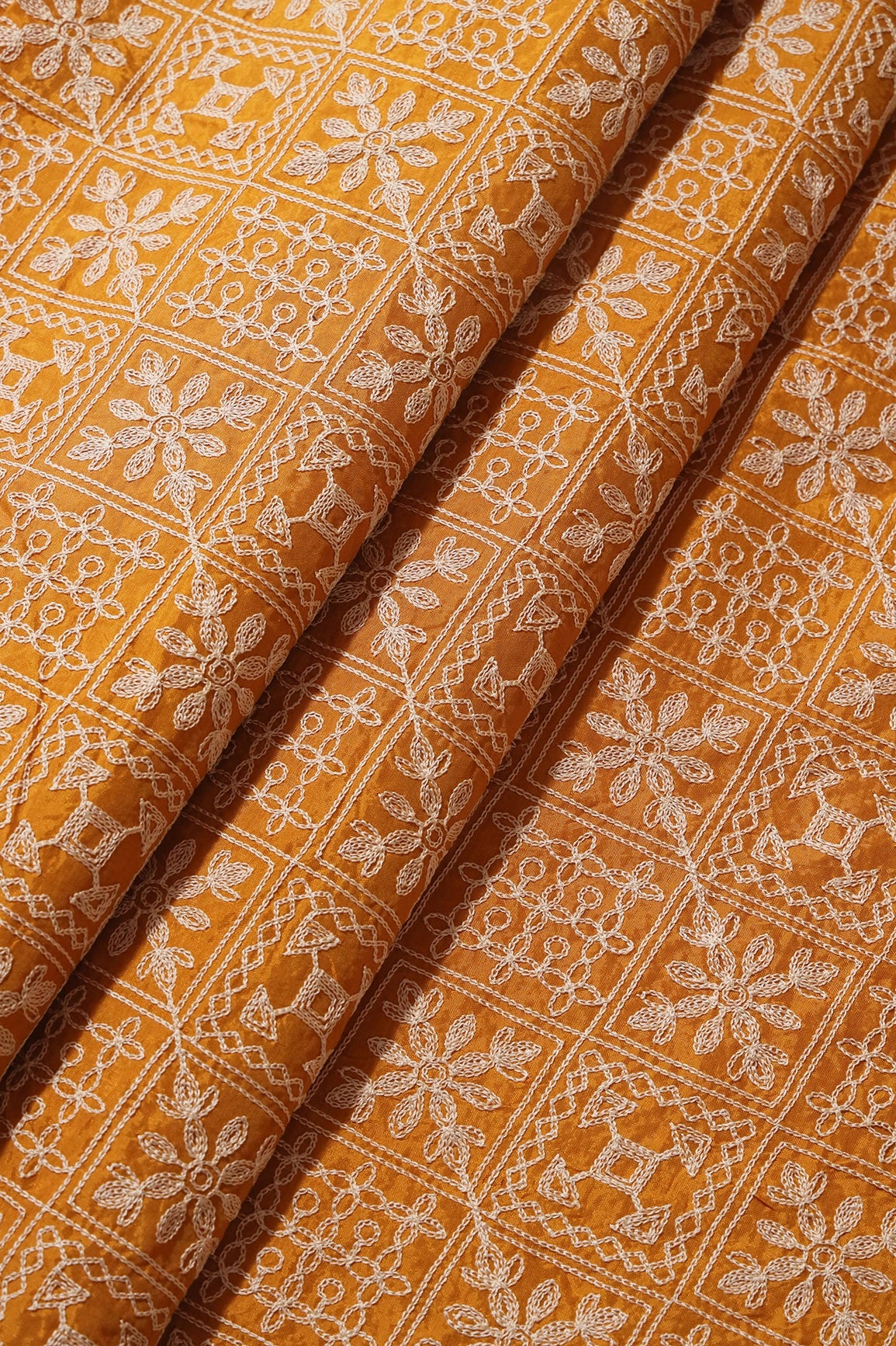 Cream Thread Geometric Embroidery Work On Mustard Viscose Muslin Silk Fabric