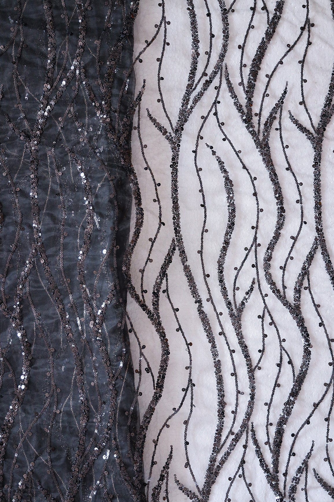 Beautiful Sequins With Black Thread Wavy Embroidery Work On Black Soft Net Fabric - doeraa