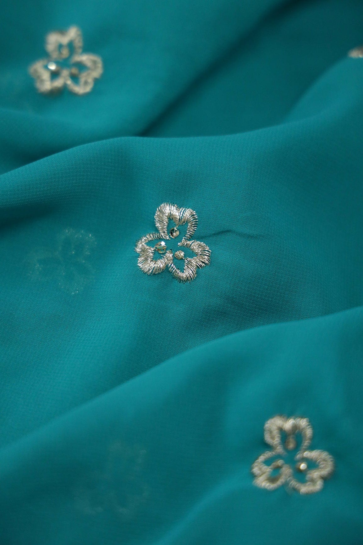 Big Width''56'' Silver Zari Leafy Embroidery Work On Rama Georgette Fabric With Border - doeraa