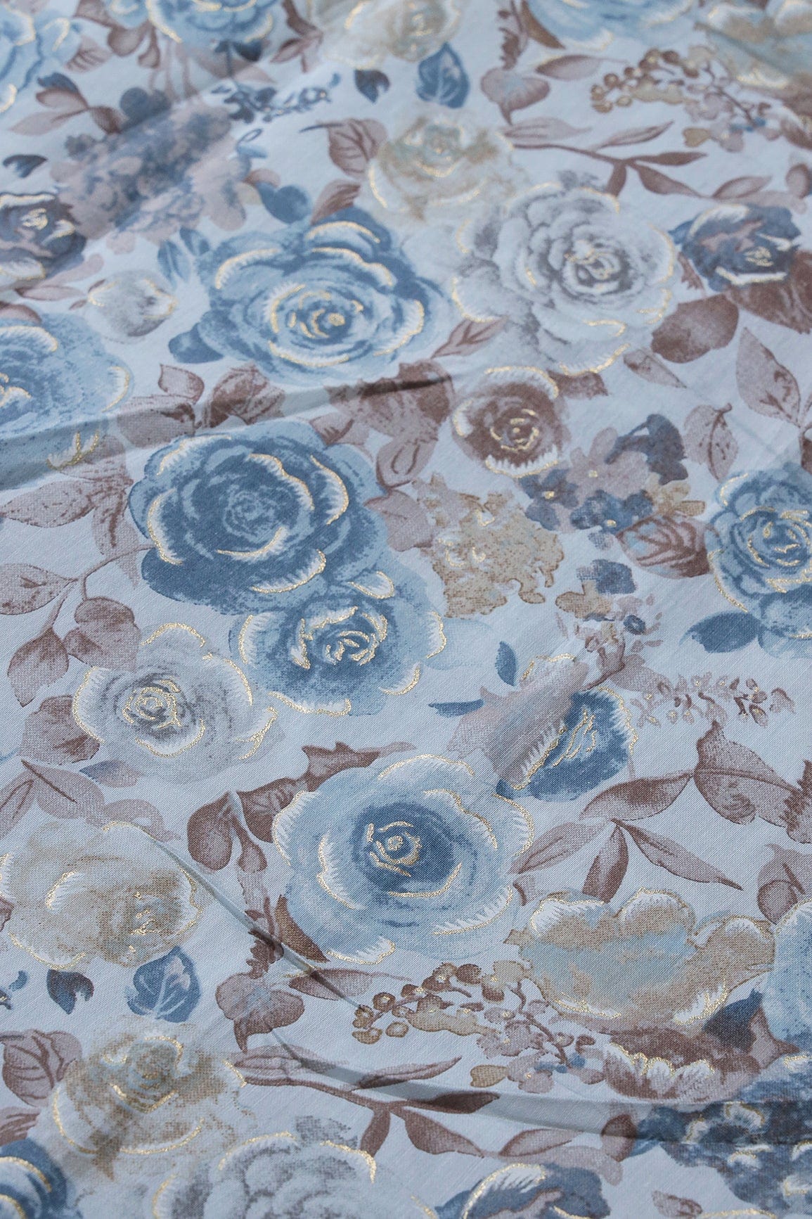 Blue And Brown Floral Foil Print On Pastel Blue Viscose Chanderi Silk Fabric - doeraa