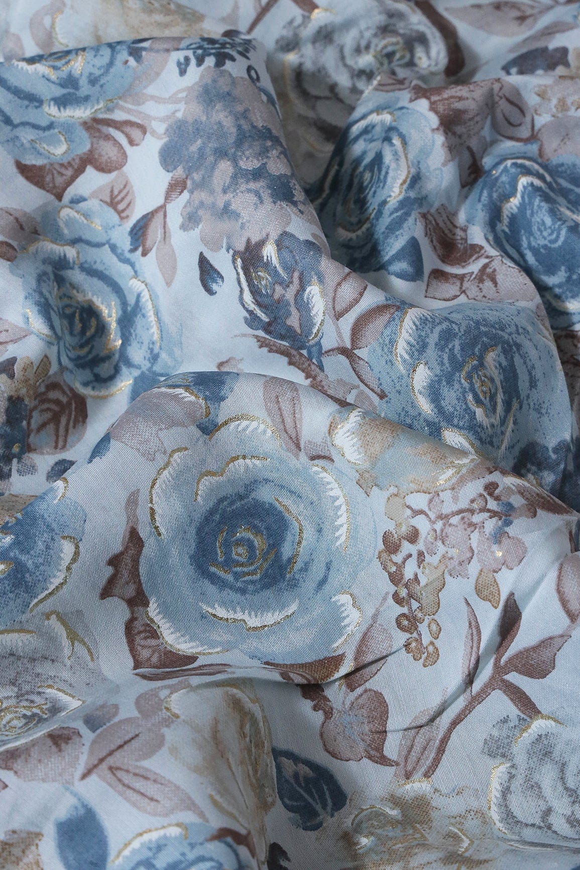 Blue And Brown Floral Foil Print On Pastel Blue Viscose Chanderi Silk Fabric - doeraa