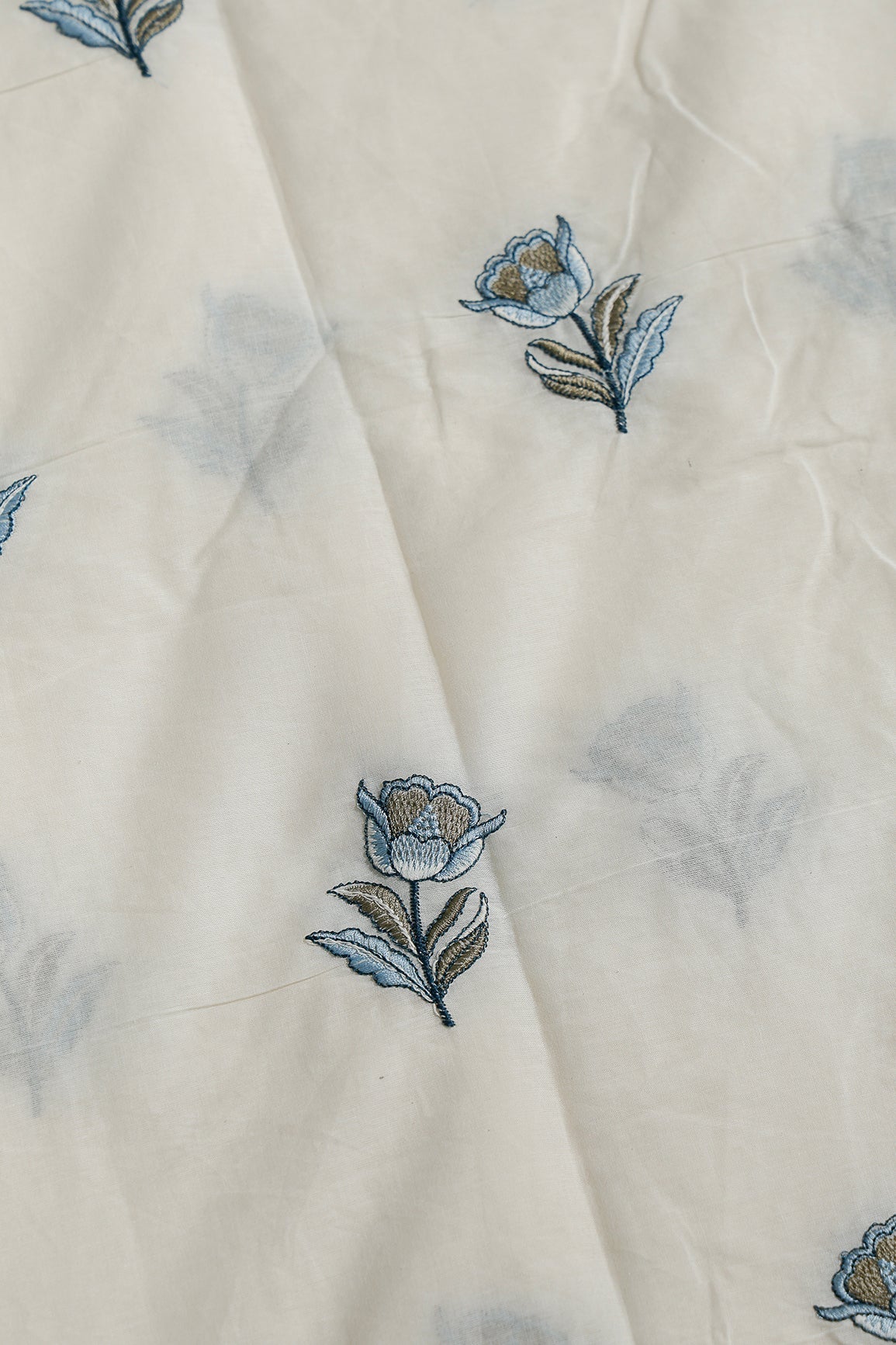 Blue And Olive Thread Beautiful Floral Embroidery Work On Off White Organic Cotton Fabric - doeraa