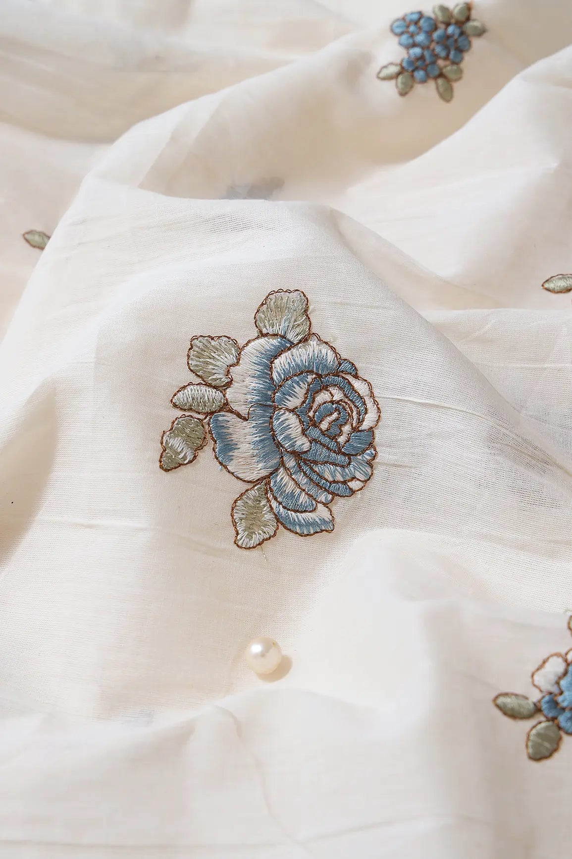 Blue And Olive Thread Floral Embroidery On Off White Organic Cotton Fabric - doeraa
