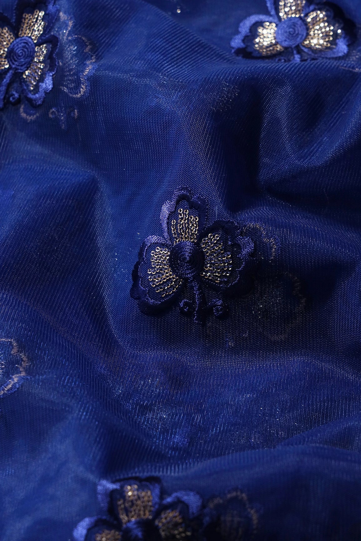 Blue Thread With Small Gold Sequins Floral Embroidery Work On Navy Blue Soft Net Fabric - doeraa