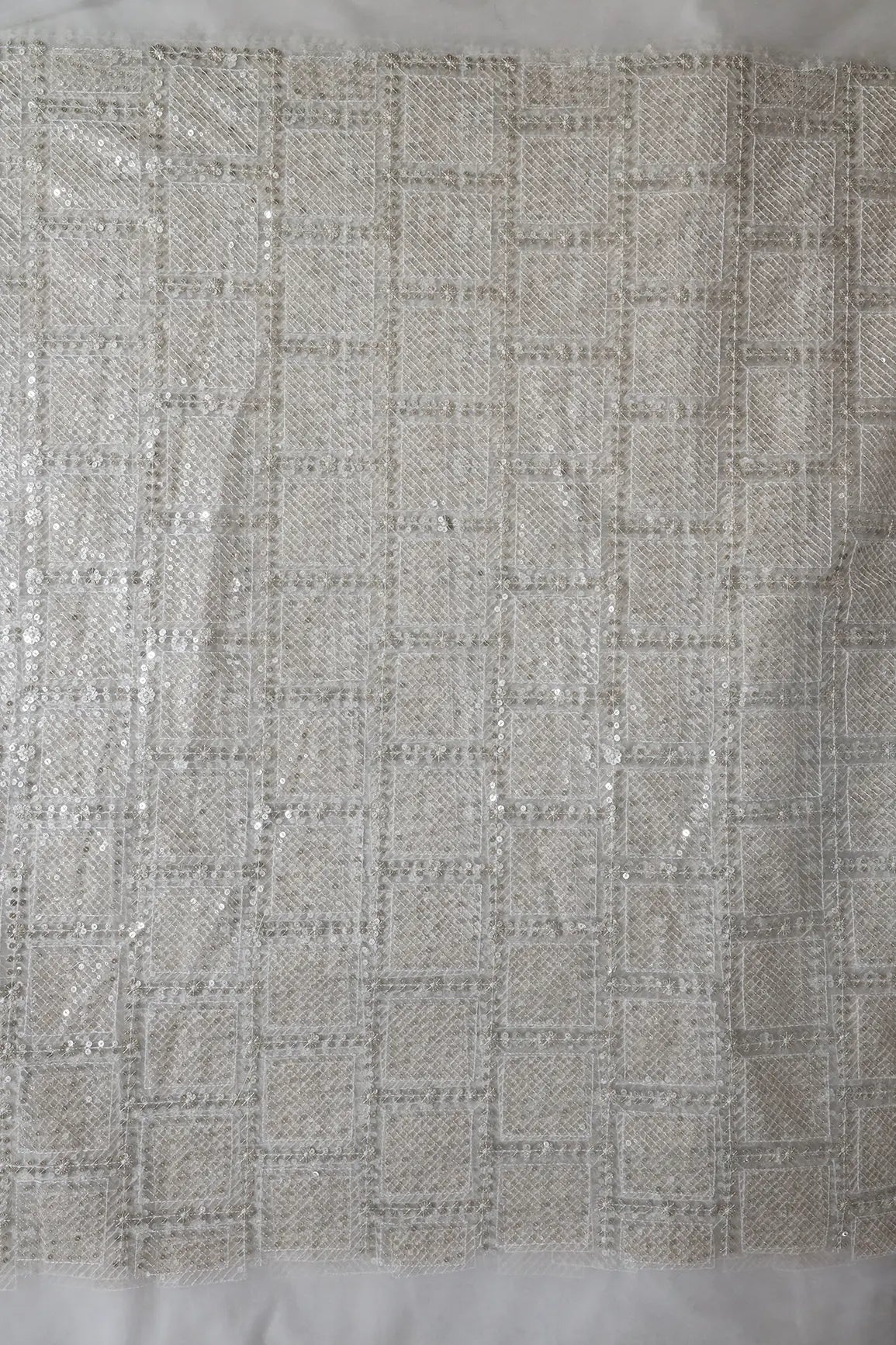 Gold And Silver Sequins Checks Embroidery On Dyeable White Soft Net Fabric - doeraa