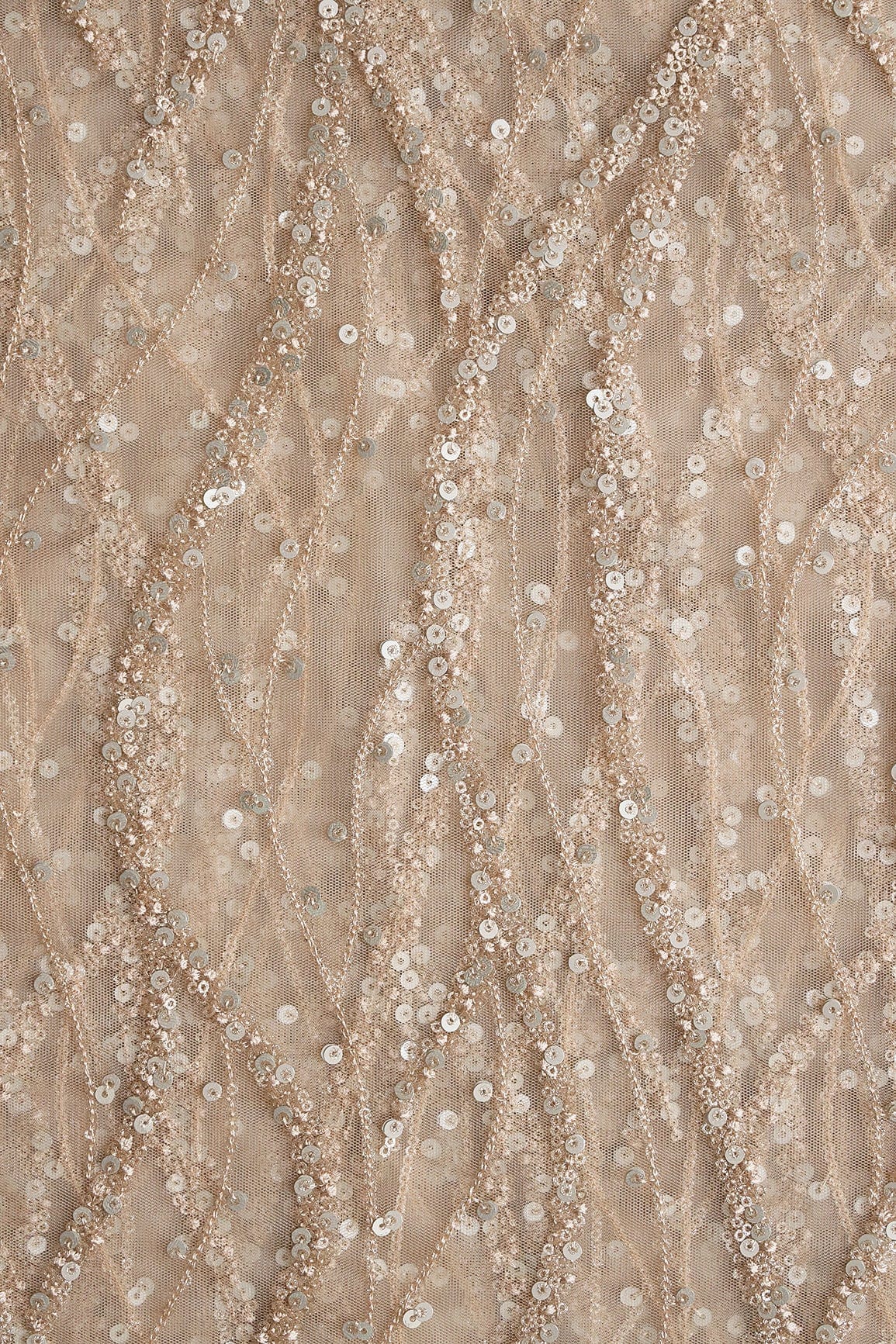 Gold And Silver Sequins With Beige Thread Wavy Embroidery On Light Beige Soft Net - doeraa