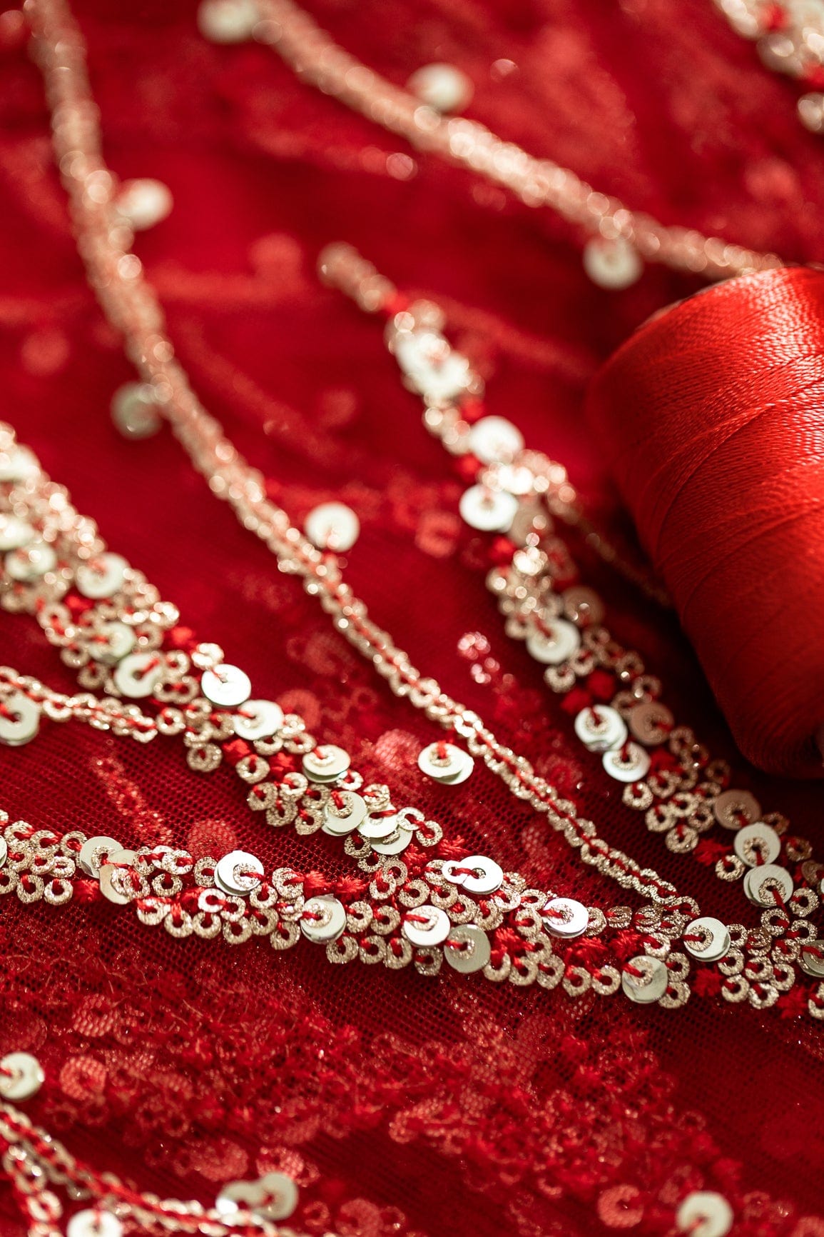 Gold And Silver Sequins With Red Thread Wavy Embroidery Work On Red Soft Net Fabric - doeraa