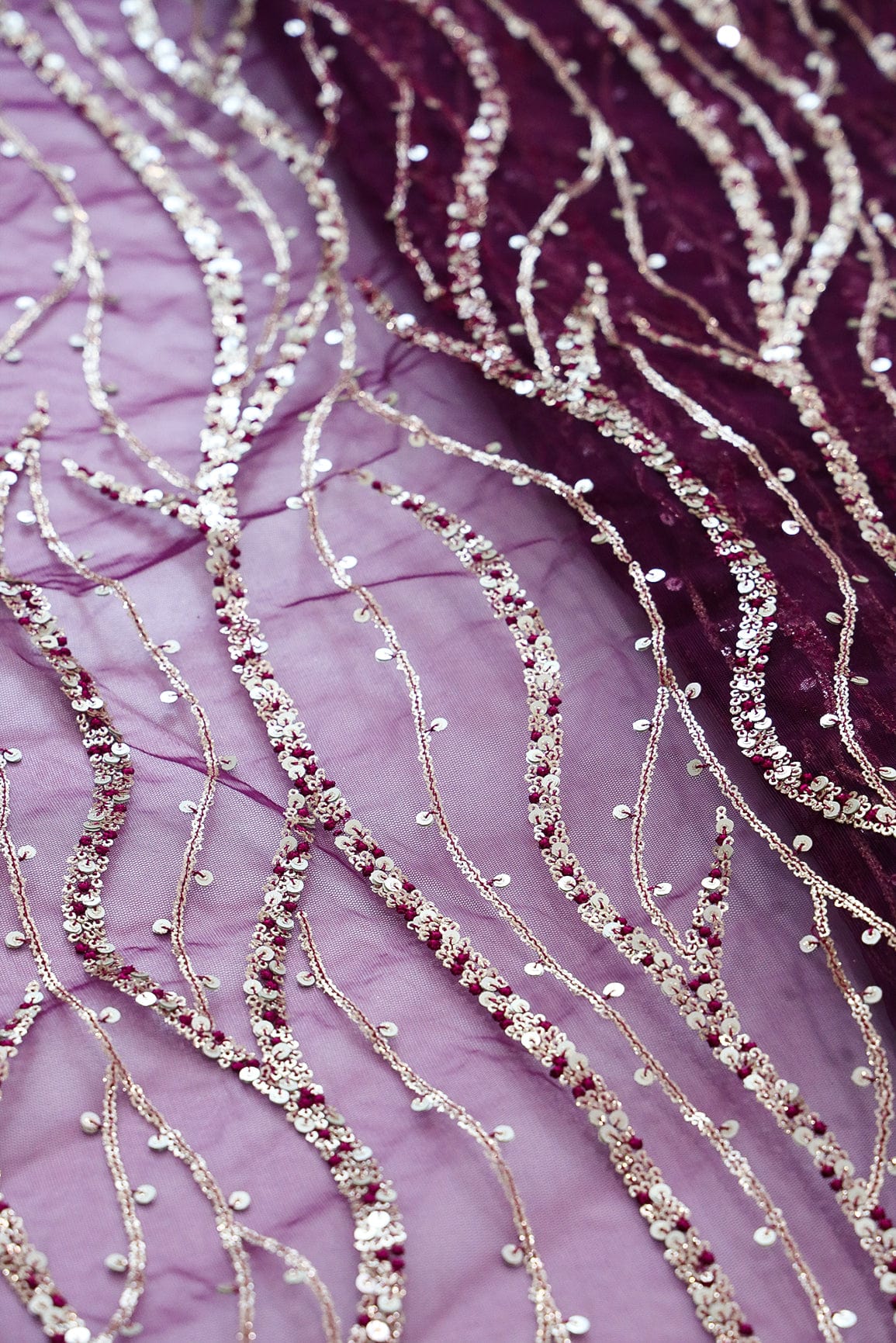 Gold And Silver Sequins With Wine Thread Wavy Embroidery Work On Wine Soft Net Fabric - doeraa