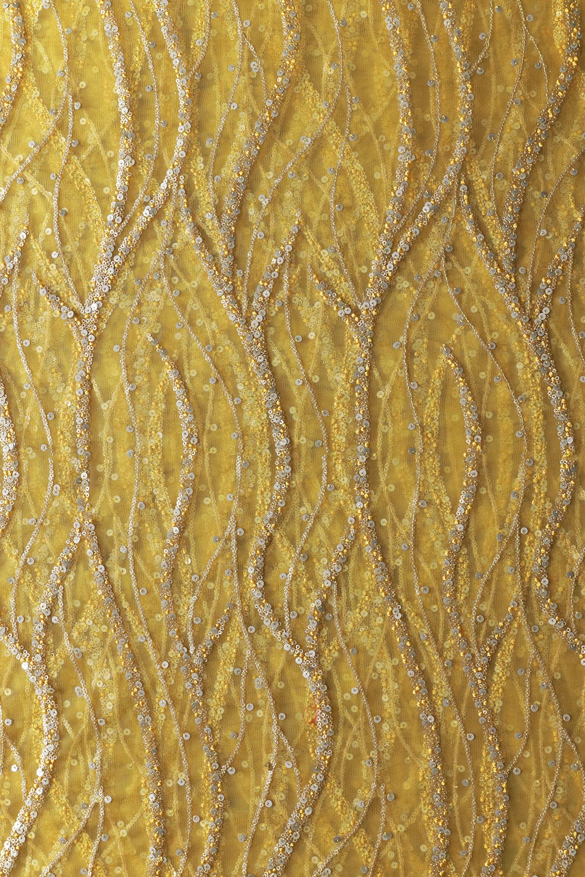 Gold And Silver Sequins With yellow Thread Wavy Embroidery Work On yellow Soft Net Fabric - doeraa