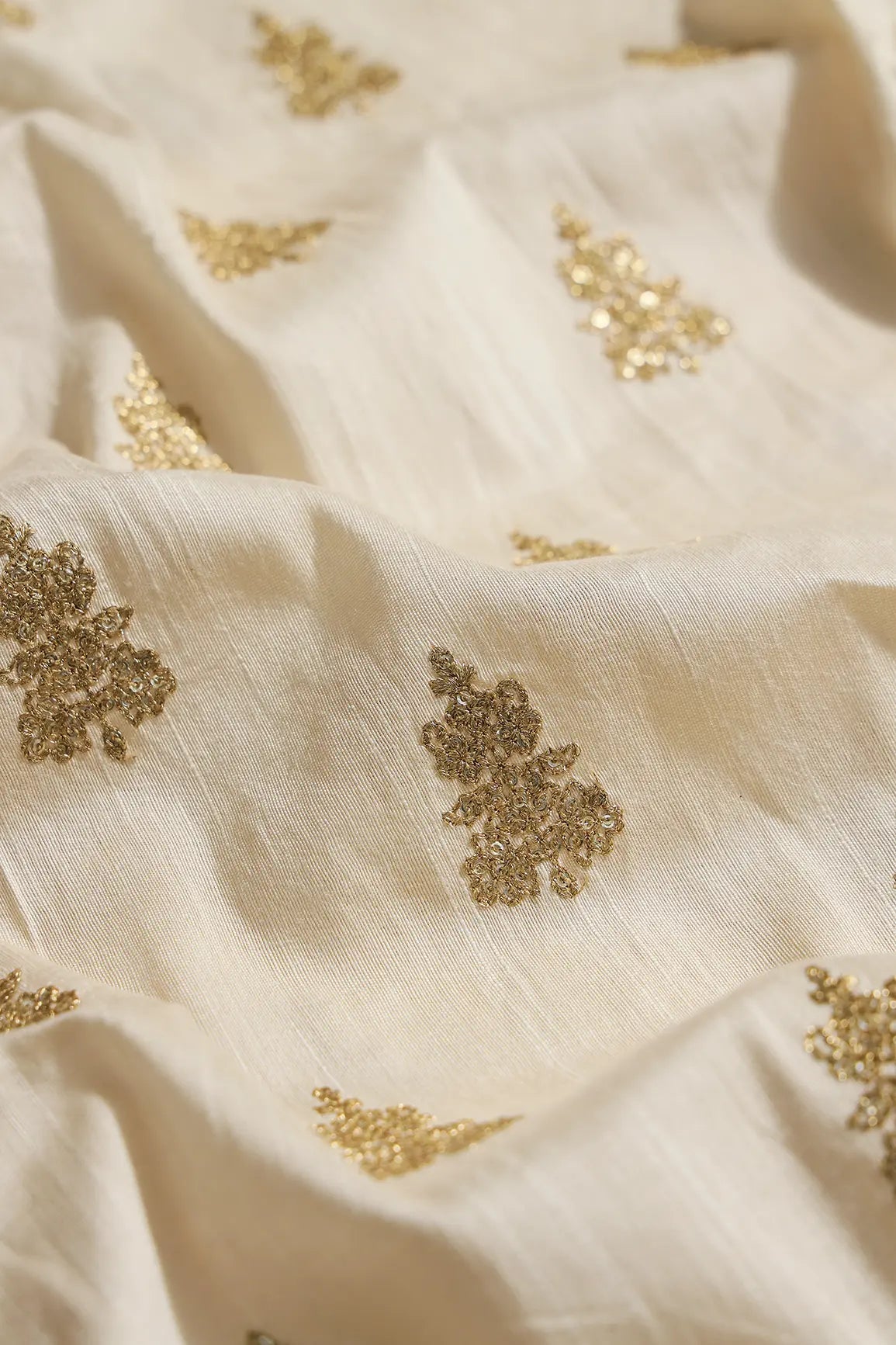 Gold Sequins With Gold Zari Big Motif Embroidery Work On Cream Raw Silk Fabric - doeraa
