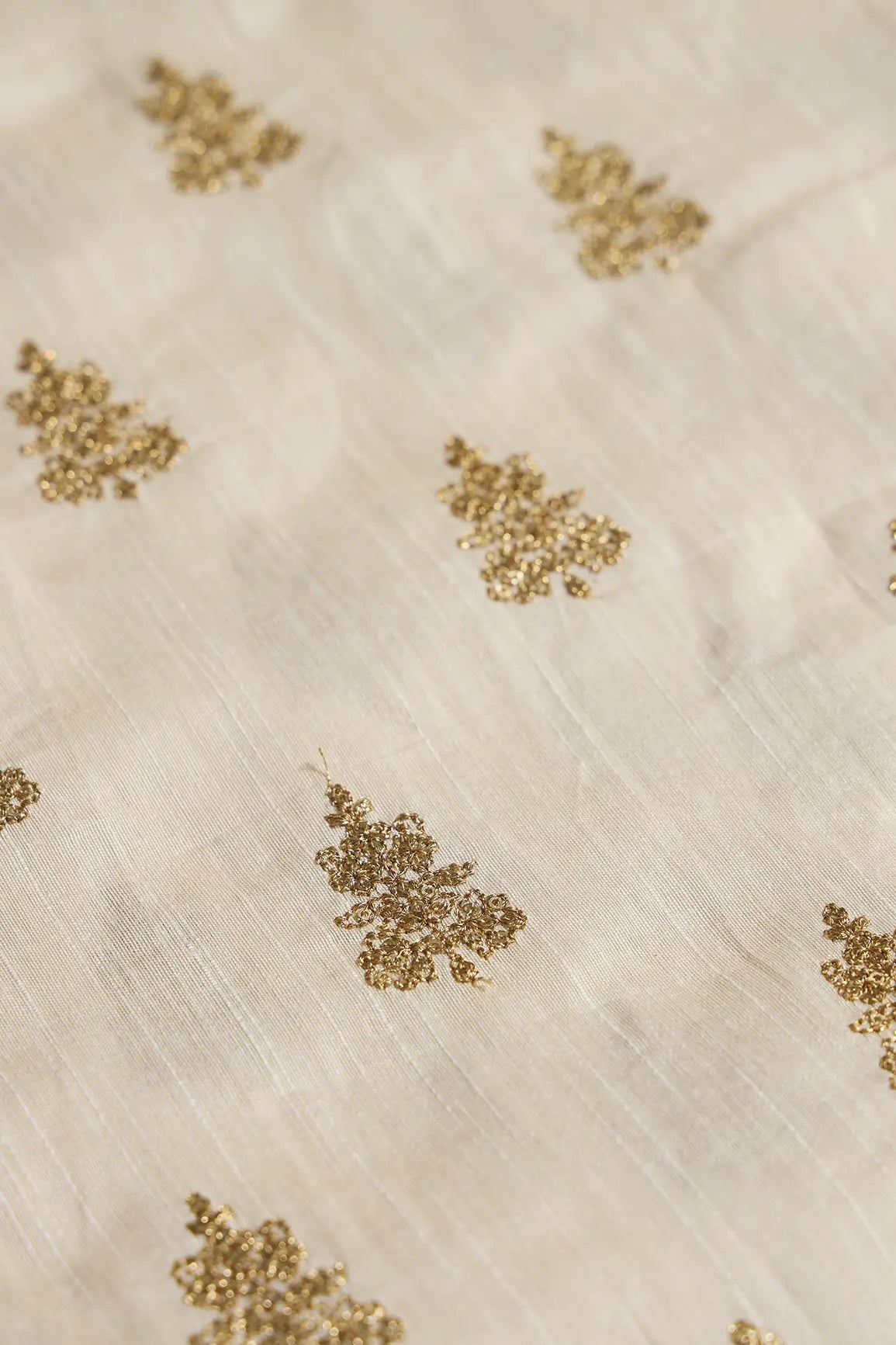 Gold Sequins With Gold Zari Big Motif Embroidery Work On Cream Raw Silk Fabric - doeraa