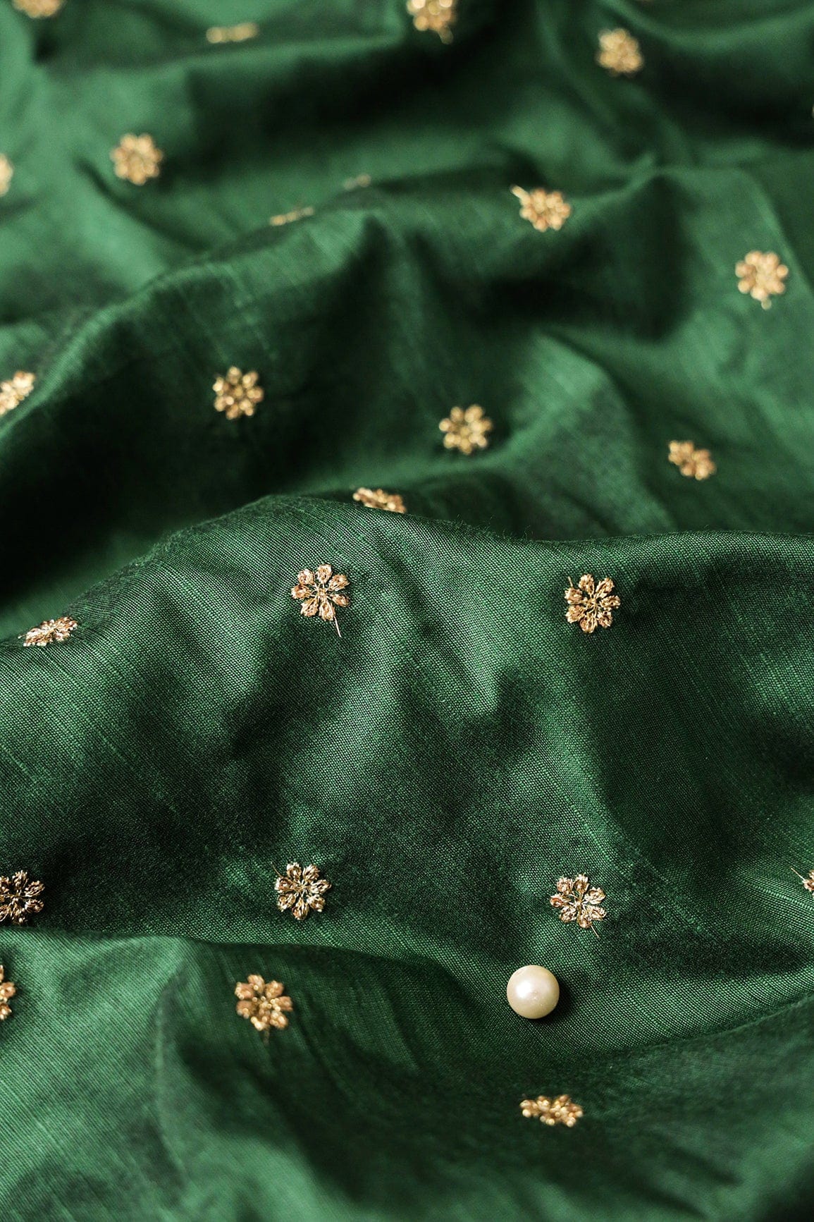 Gold Sequins With Gold Zari Small Motif Embroidery Work On Bottle Green Raw Silk Fabric - doeraa