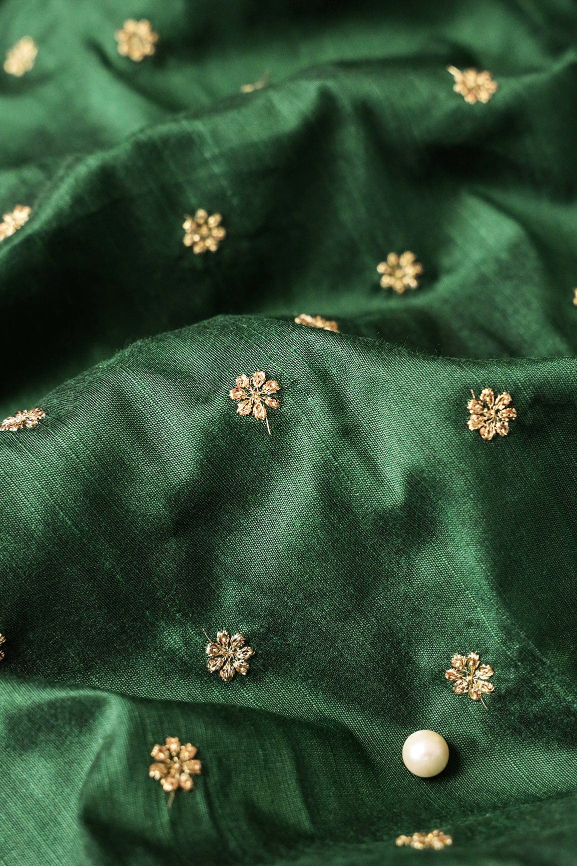 Gold Sequins With Gold Zari Small Motif Embroidery Work On Bottle Green Raw Silk Fabric - doeraa