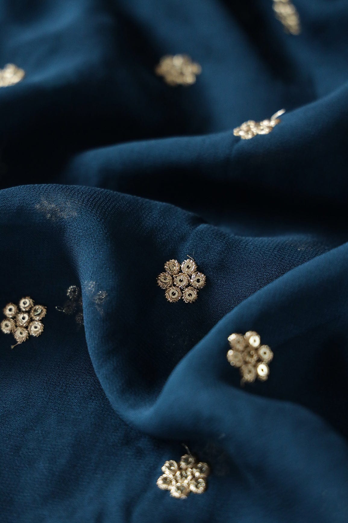 Gold Sequins With Gold Zari Small Motif Embroidery Work On Prussian Blue Georgette Fabric - doeraa