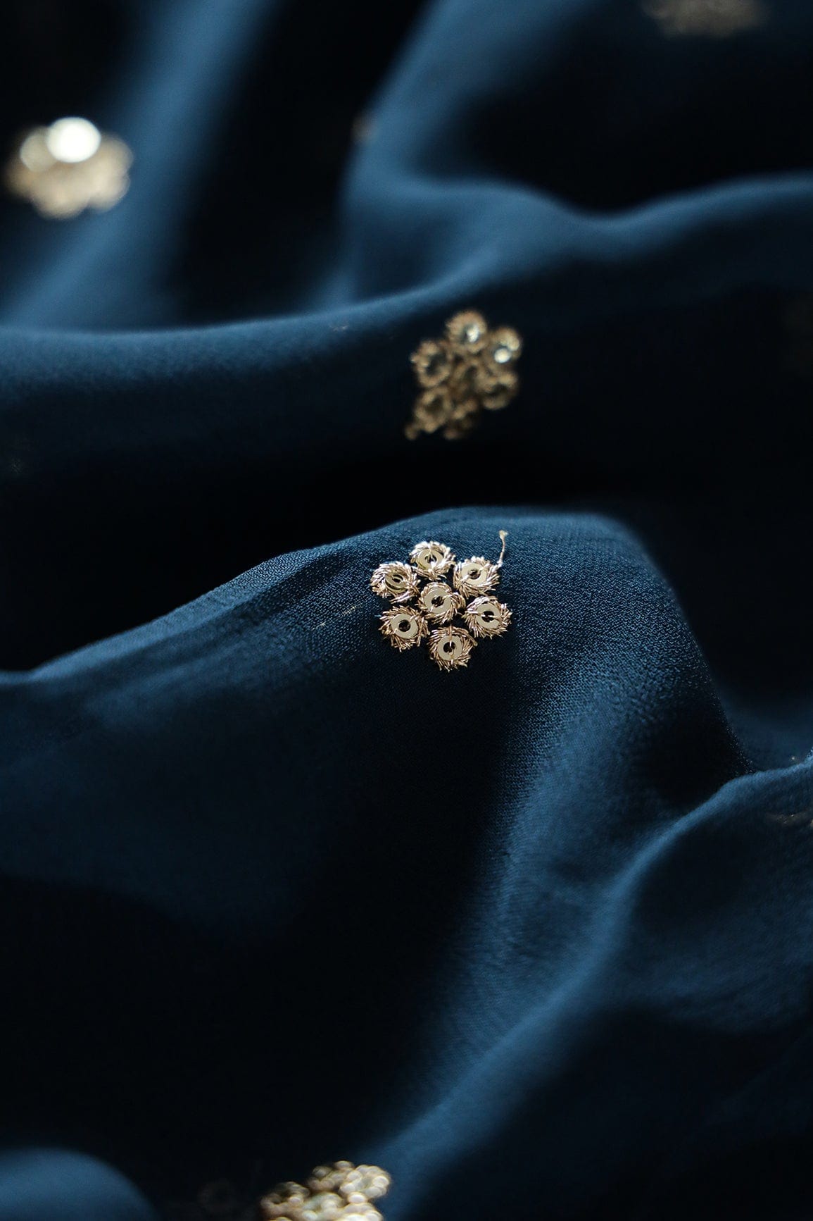 Gold Sequins With Gold Zari Small Motif Embroidery Work On Prussian Blue Georgette Fabric - doeraa