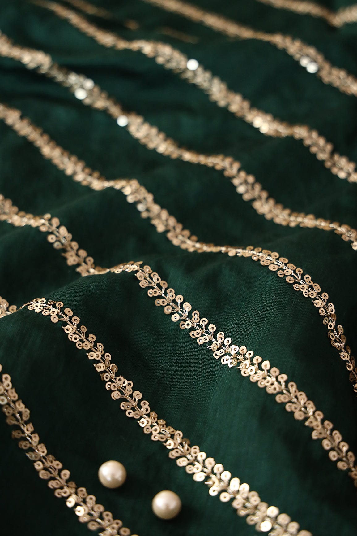 Gold Sequins With Gold Zari Stripes Embroidery Work On Bottle Green Raw Silk Fabric - doeraa