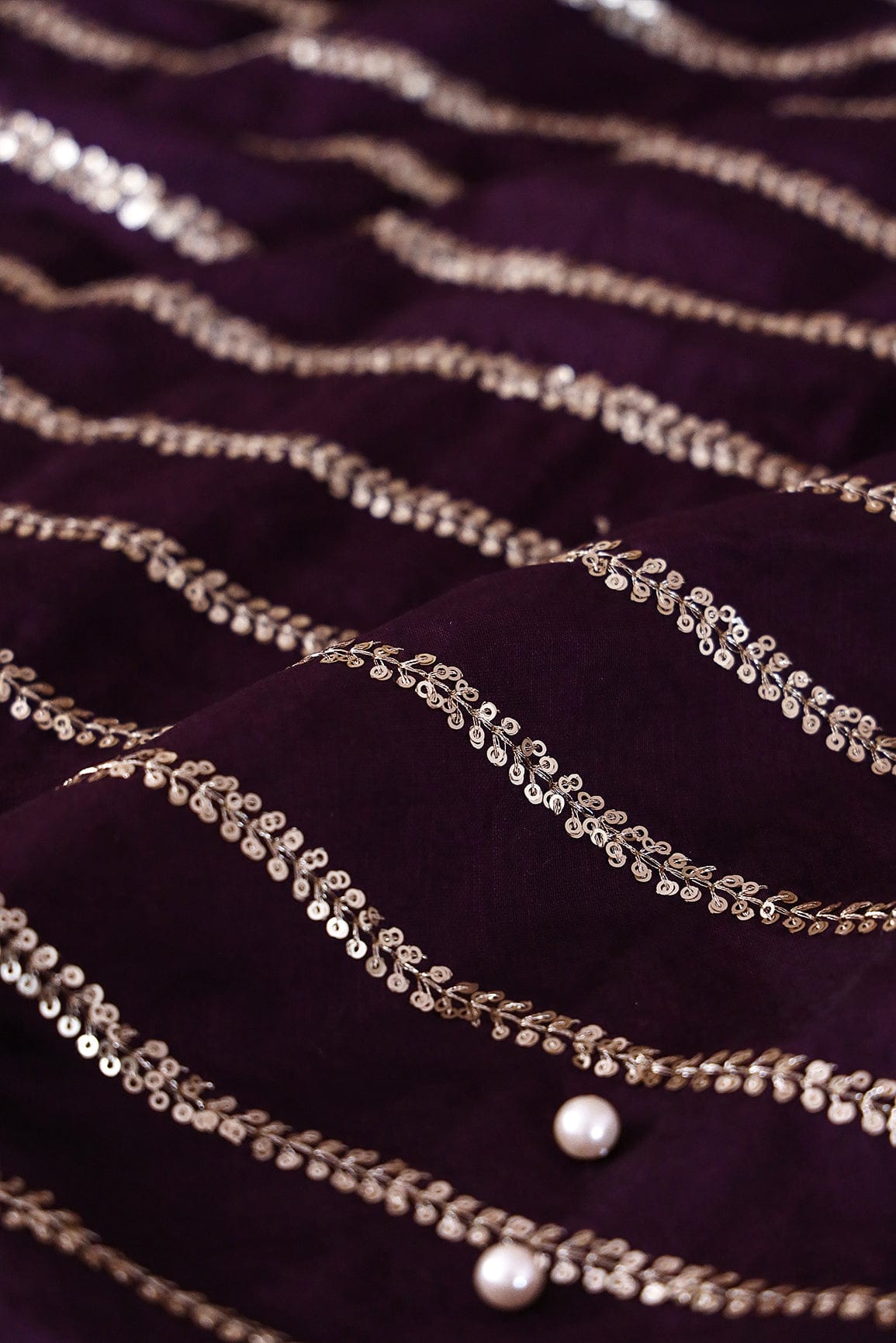 Gold Sequins With Gold Zari Stripes Embroidery Work On Wine Raw Silk Fabric - doeraa