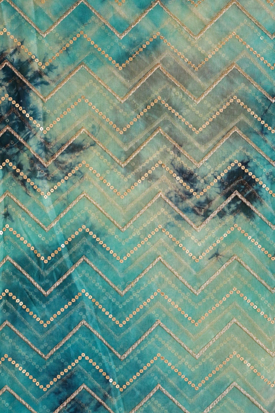 Gold Zari With Gold Sequins Chevron Embroidery Work On Tie & Dye Turquoise And Light Blue Organza Fabric - doeraa