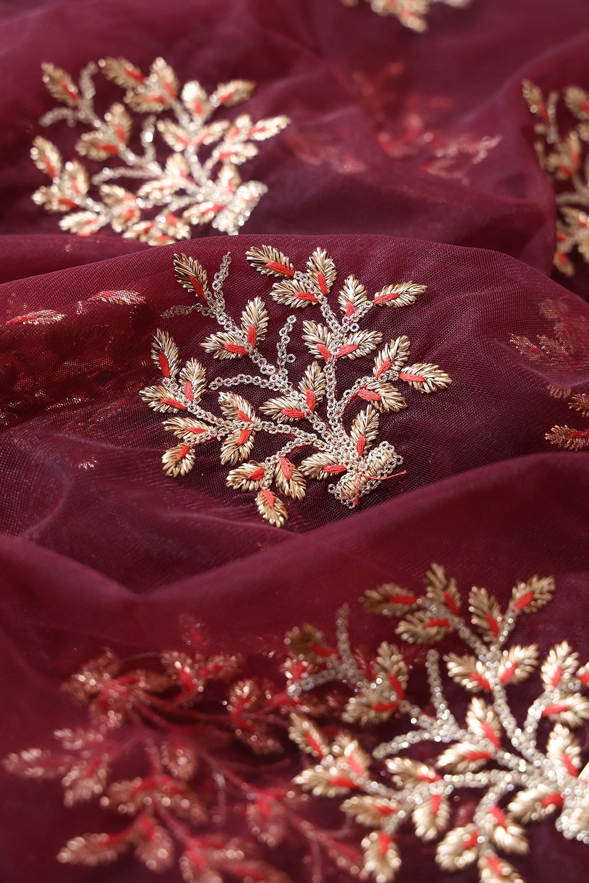 Gold Zari With Gold Sequins Floral Butta Embroidery On Maroon Soft Net Fabric - doeraa
