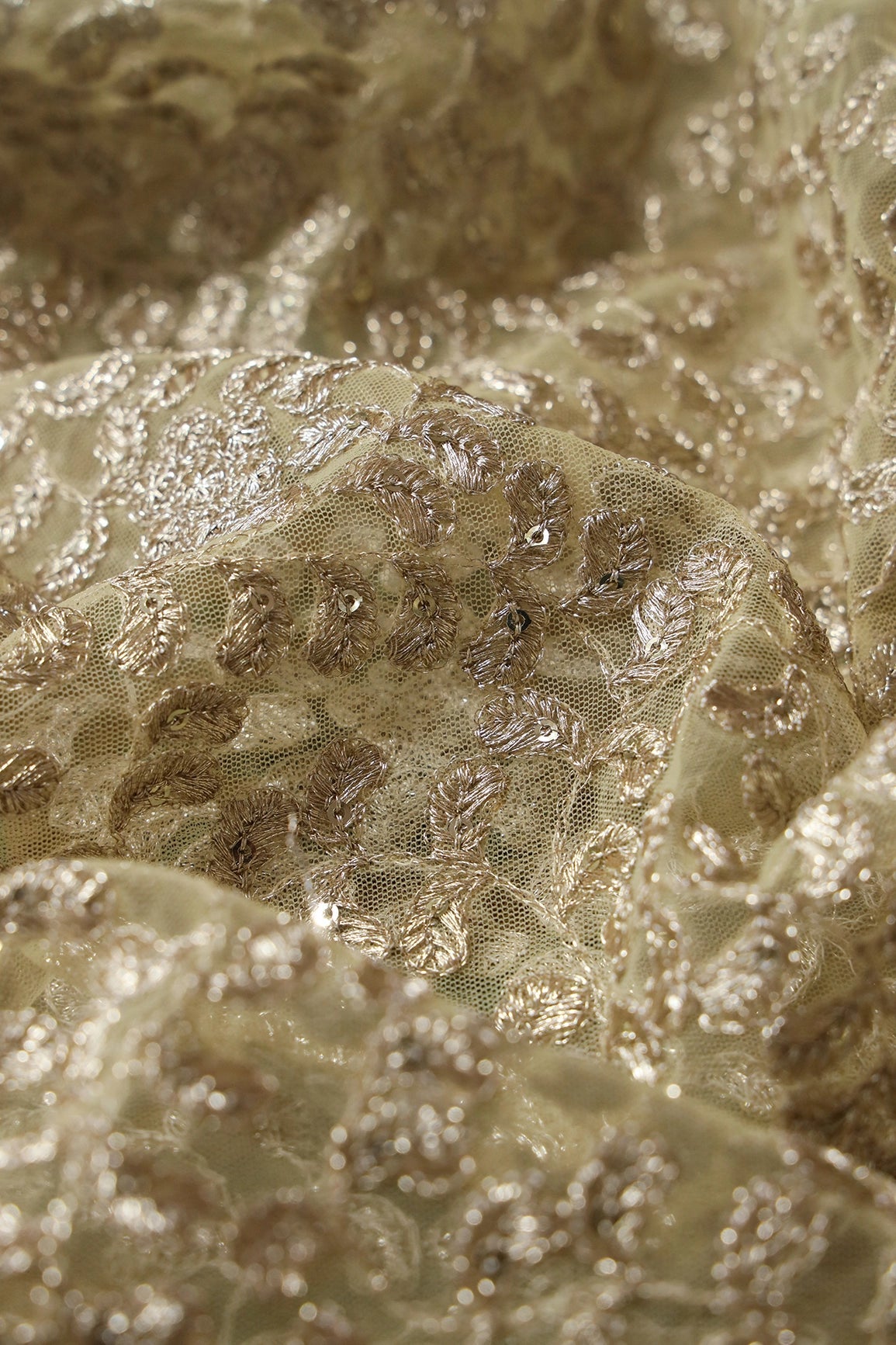 Gold Zari With Gold Sequins Leafy Heavy Embroidery Work On Pastel Yellow Soft Net Fabric - doeraa