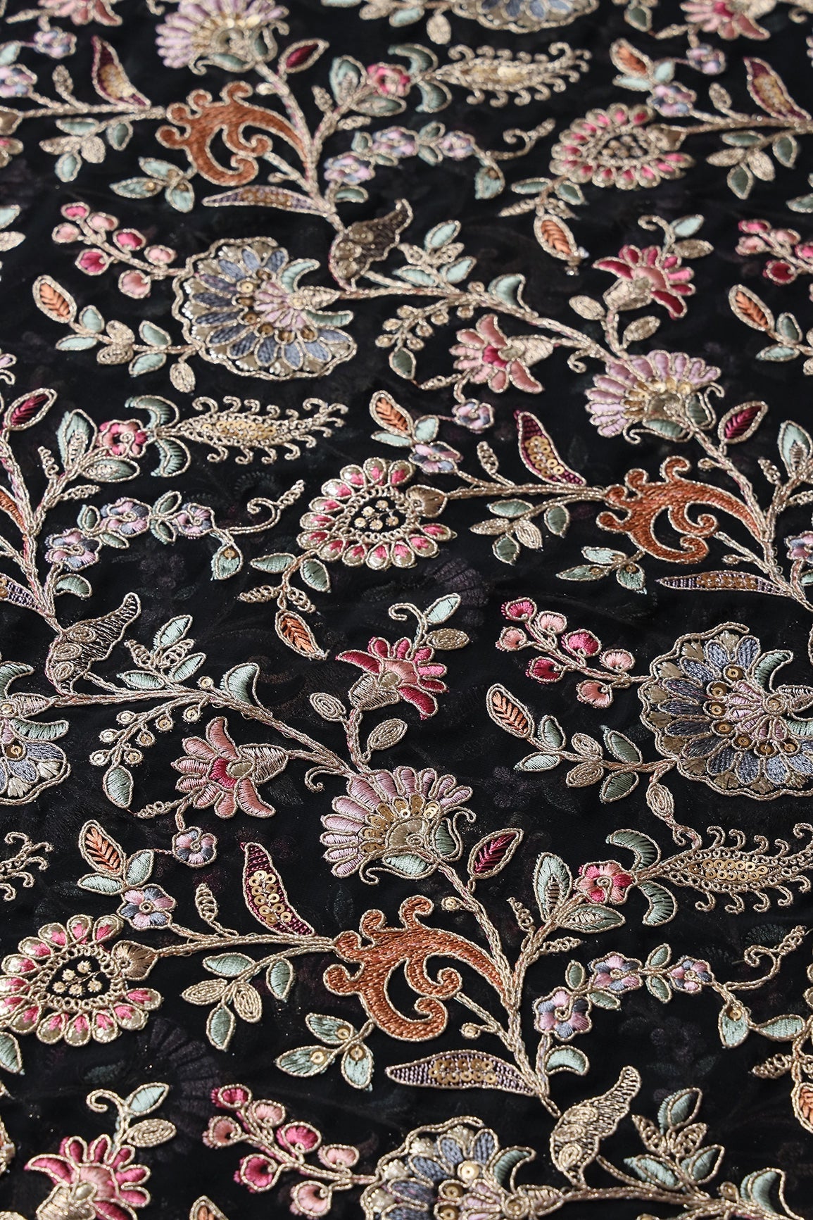 Gorgeous Pastel Threads With Gold Zari Floral Heavy Embroidery On Black Georgette Fabric - doeraa