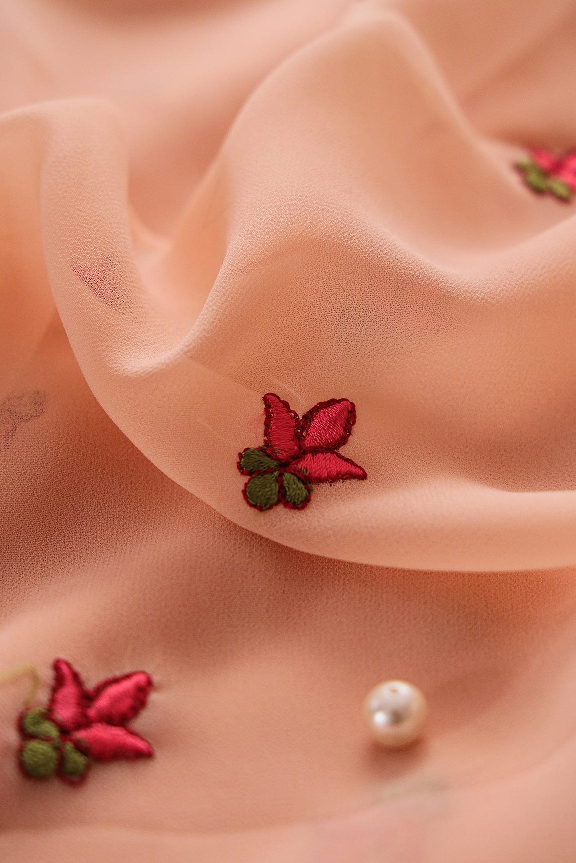 Multi Colour Subtle Floral Embroidery On Peach Georgette Fabric - doeraa