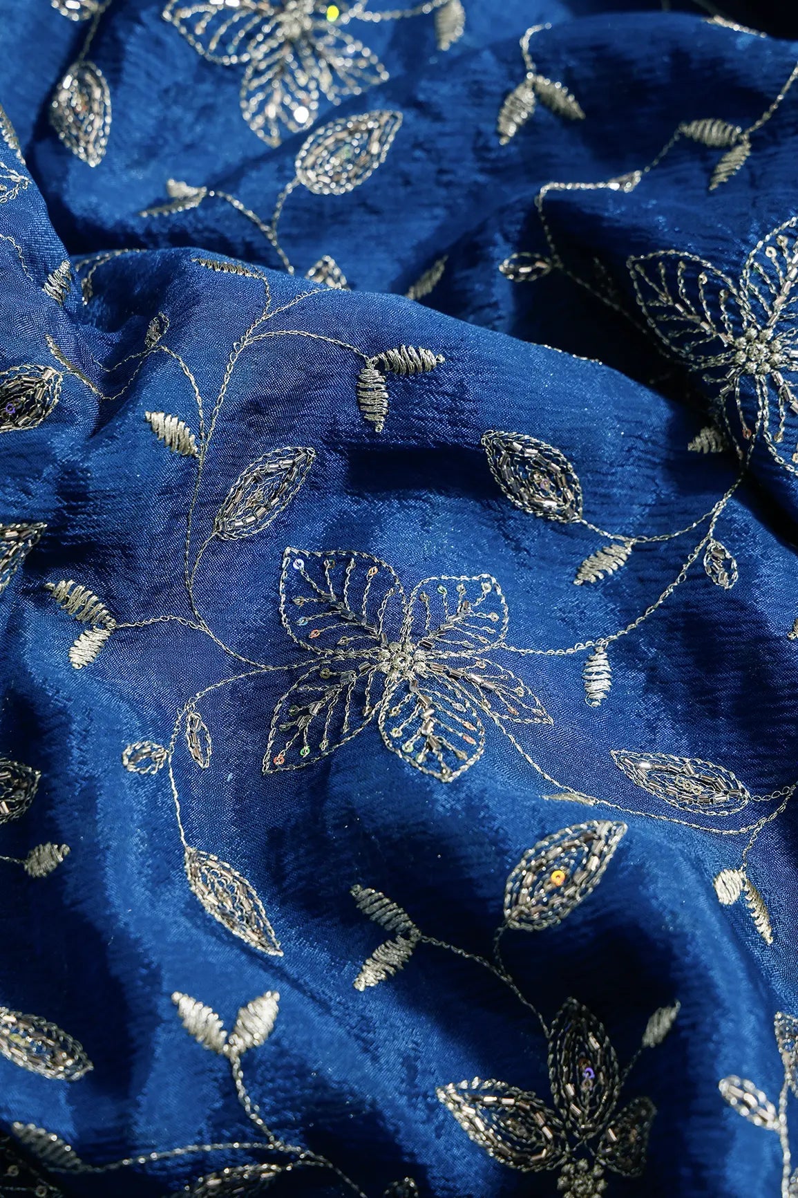 Multi Sequins & Beads With Zari Floral Leafy Embroidery Work On Prussian Blue Chinnon Chiffon Fabric - doeraa