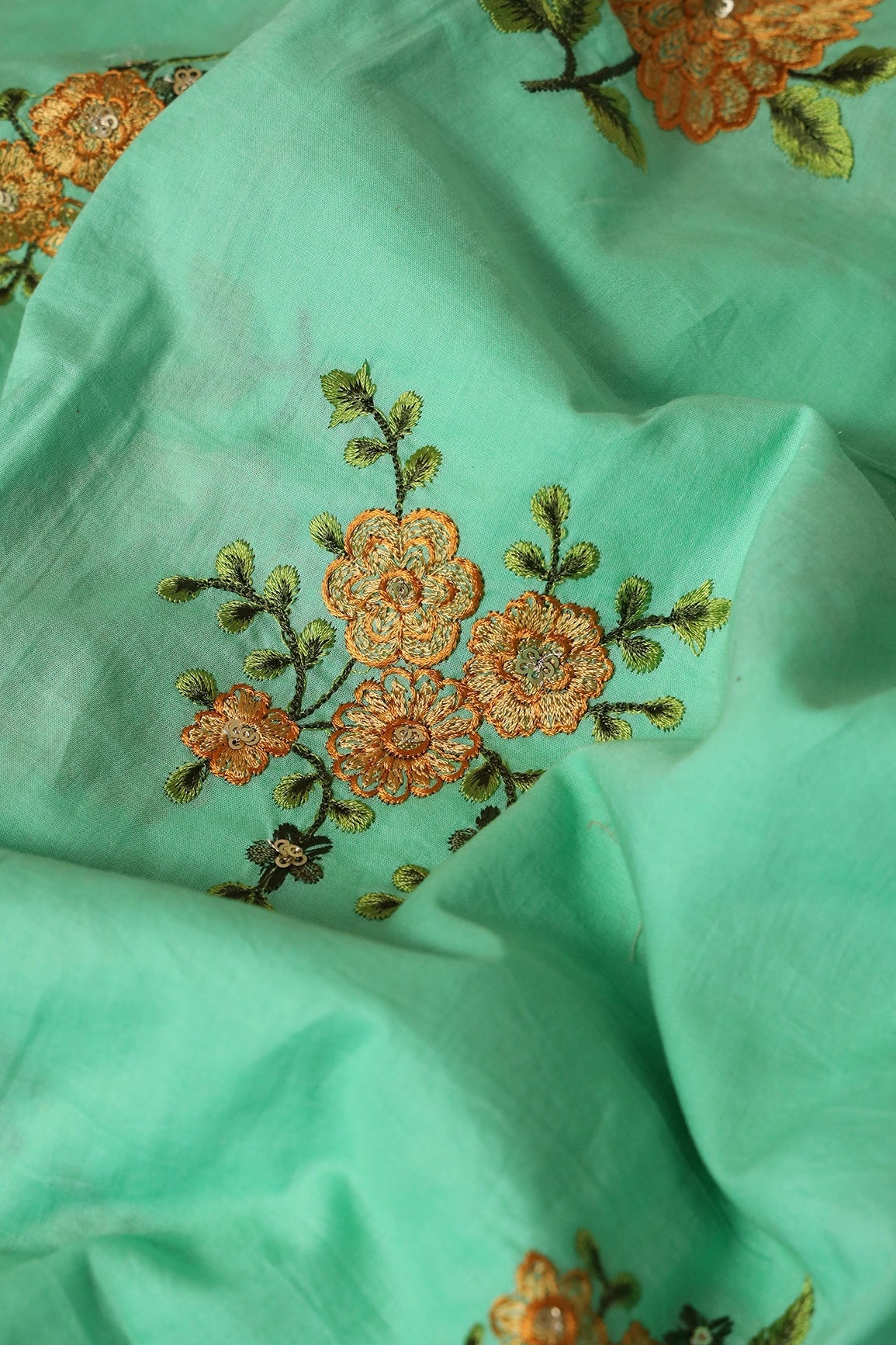 Mustard And Olive Thread Small Floral Embroidery Work On Sea Green Organic Cotton Fabric - doeraa